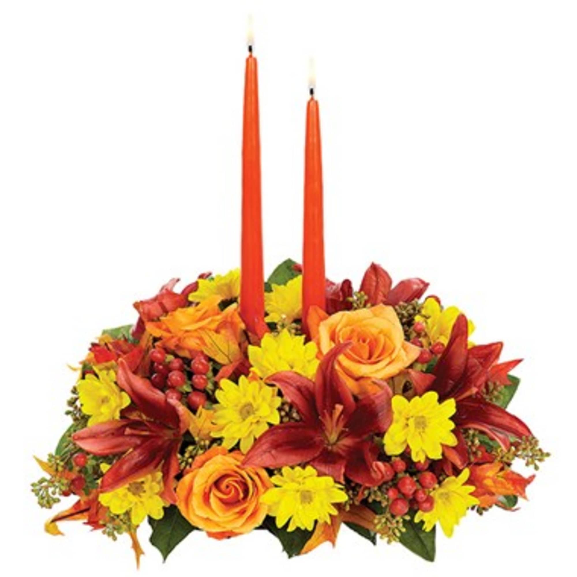 Autumn floral centerpiece with two orange taper candles