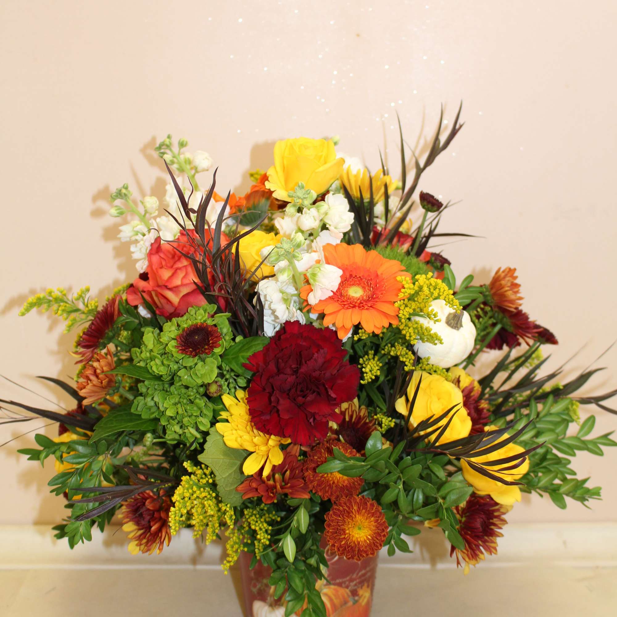 A festive autumn arrangement filled with an array of flowers including gerberas, photo 2 of 4