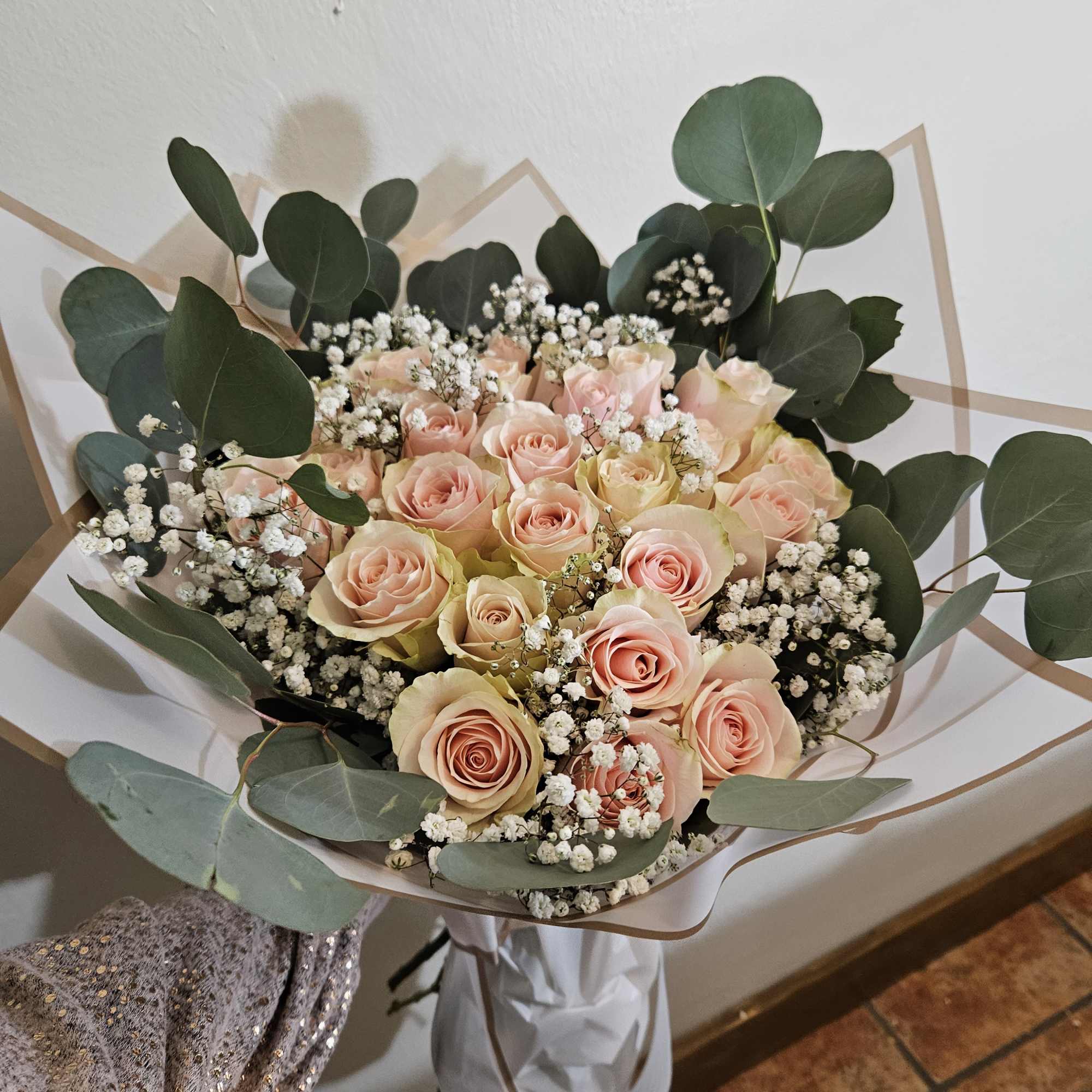 Bouquet of pale pink roses with white baby's breath and eucalyptus, photo 2 of 2