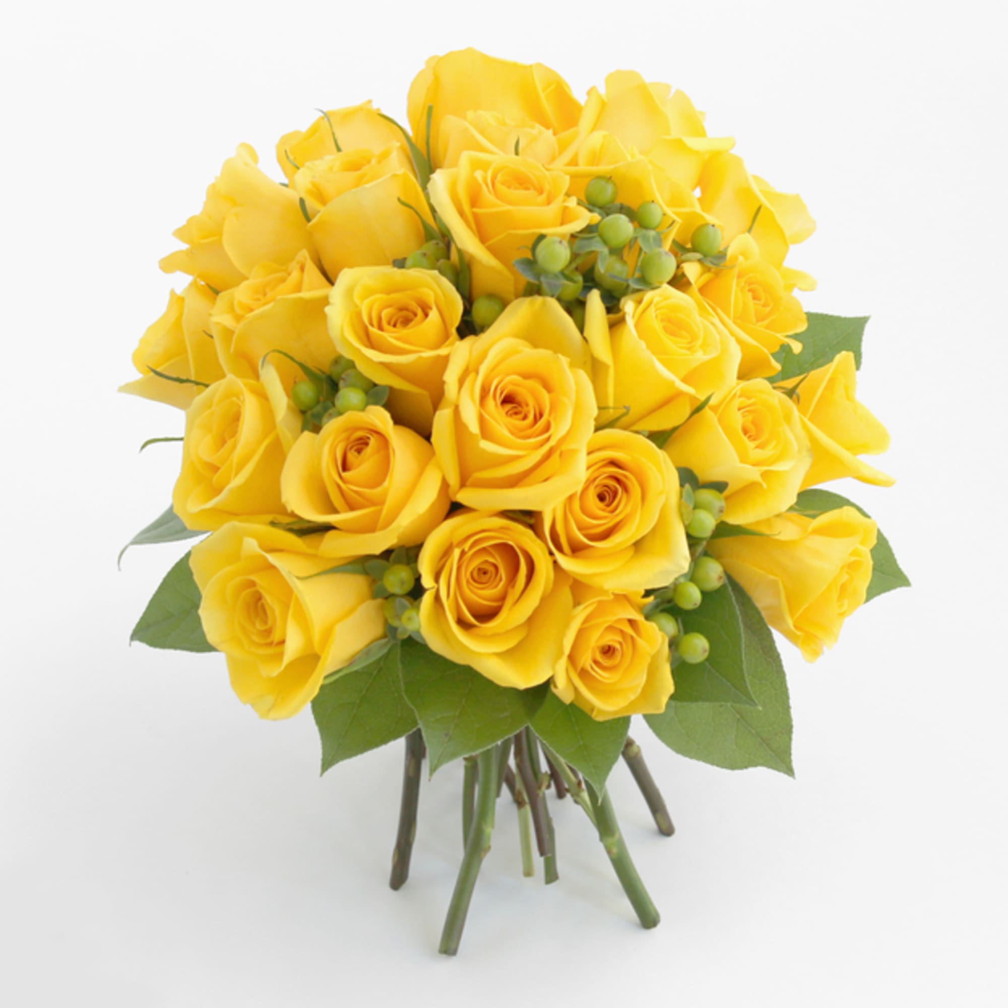 Bouquet of yellow roses with green berries