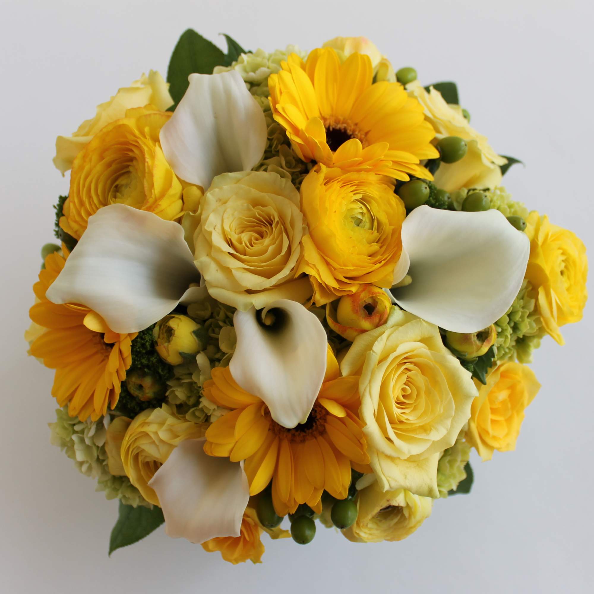 Yellow bouquet with white calla lilies and roses