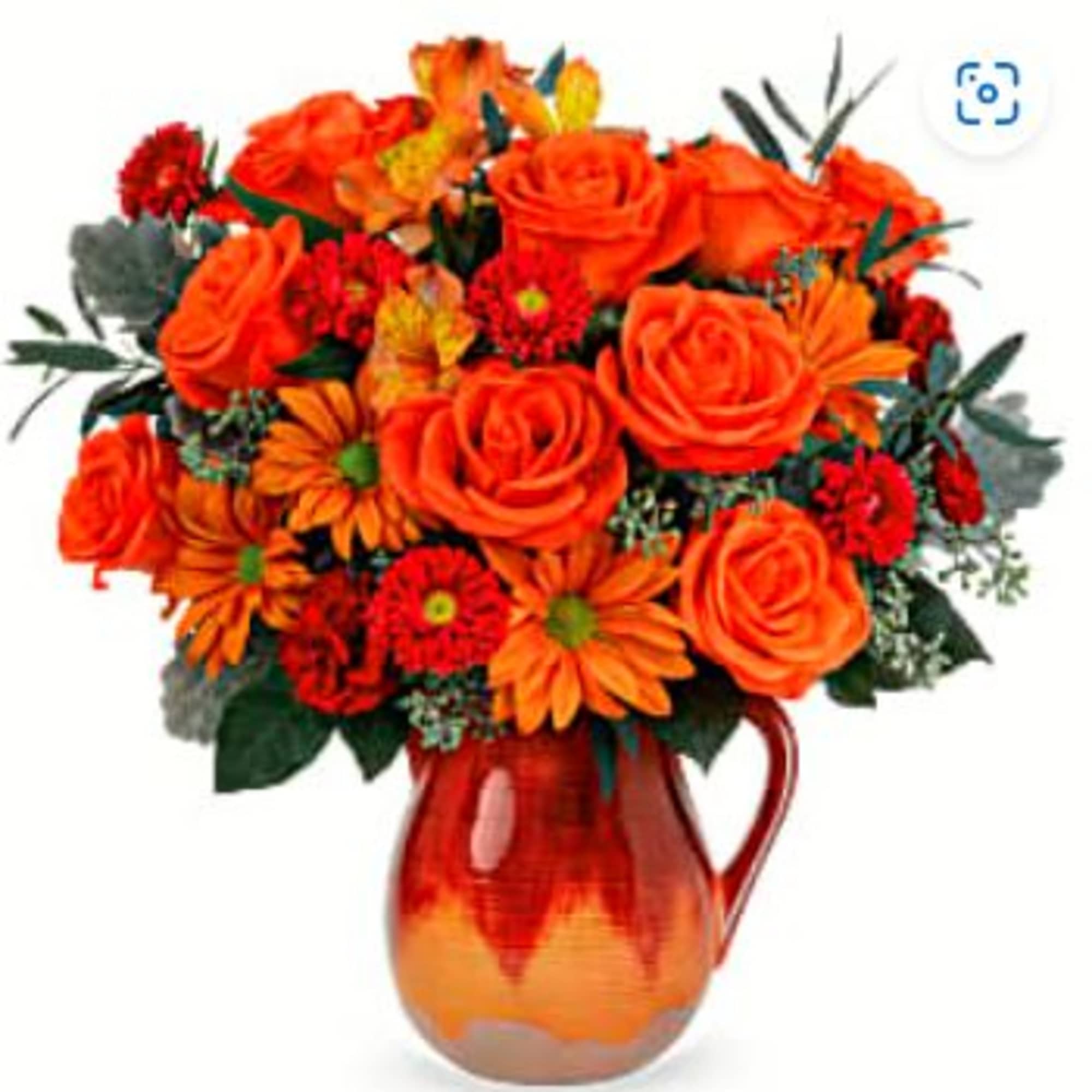 Orange roses, orange alstroemeria, bronze daisy spray chrysanthemums, red matsumoto asters and
