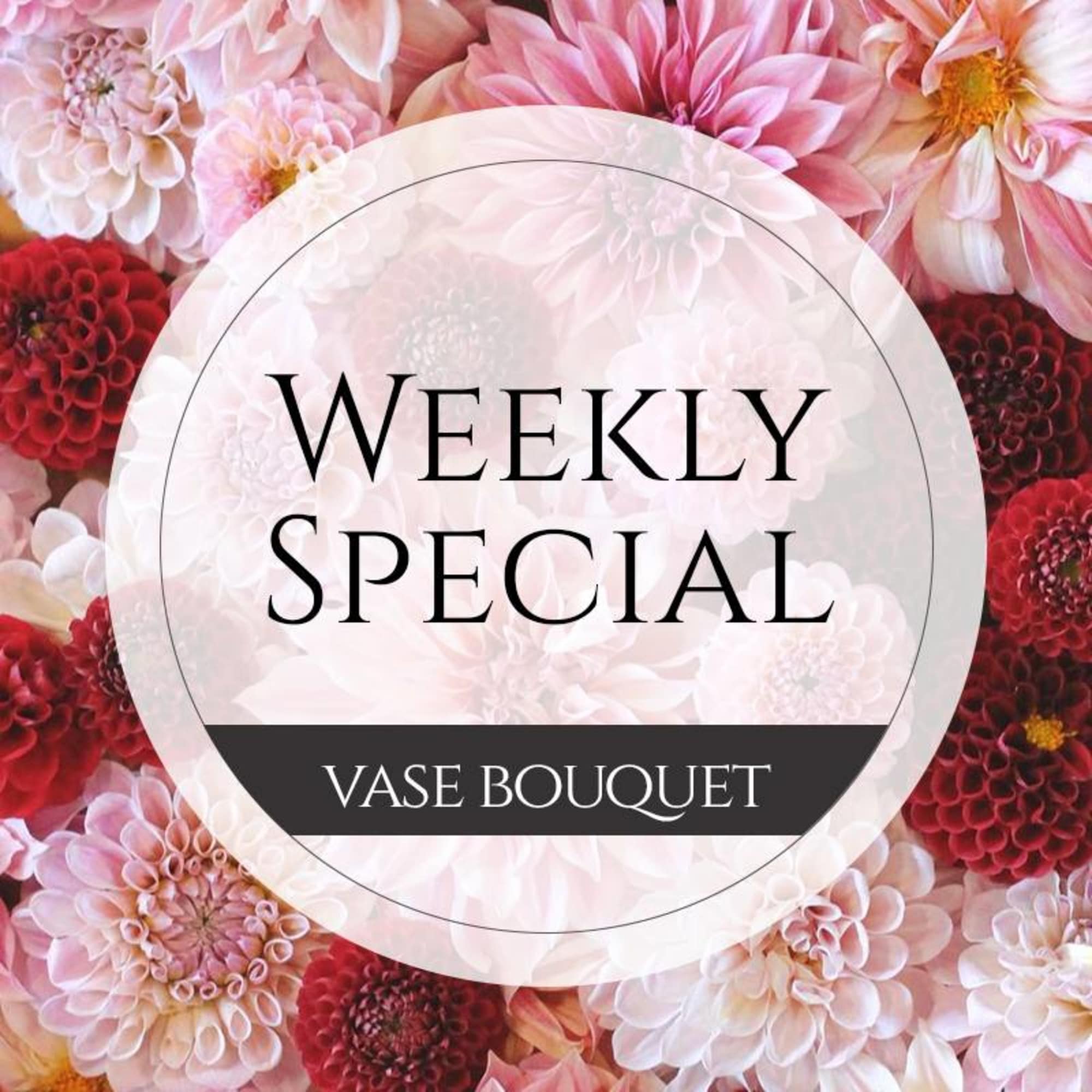 Pink and red dahlia bouquet with a weekly special label