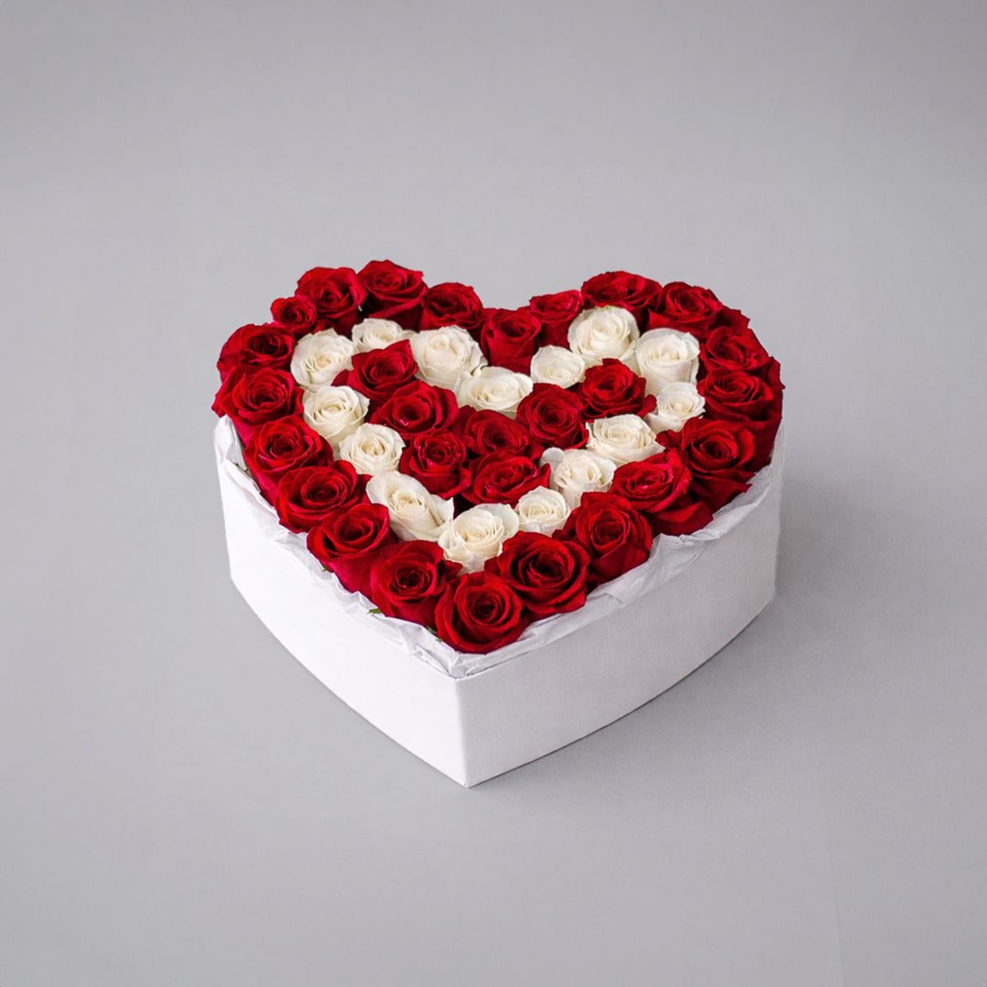 Heart of Devotion is a striking heart-shaped arrangement crafted with premium red, photo 2 of 2