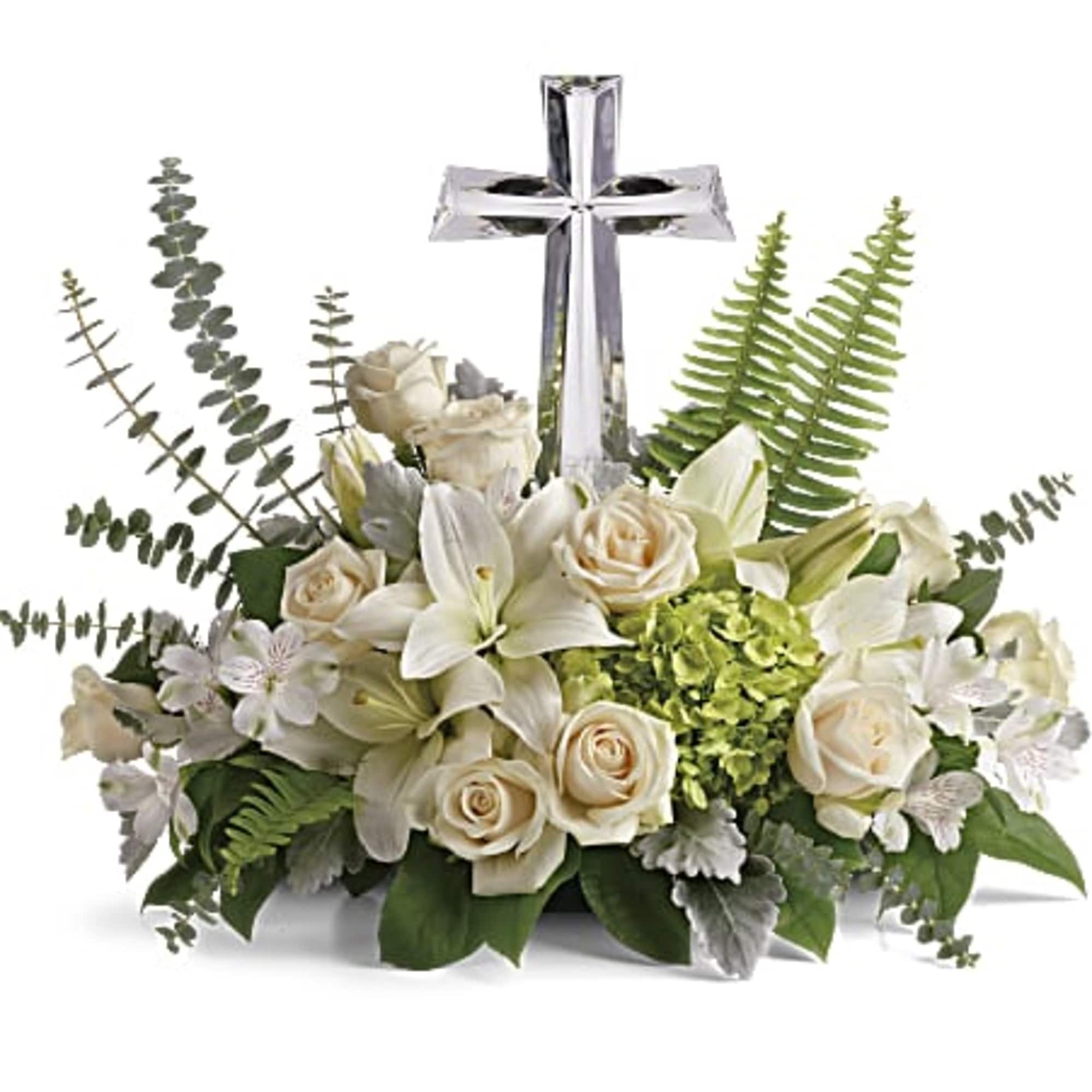 White floral arrangement with a silver cross centerpiece, photo 3 of 3