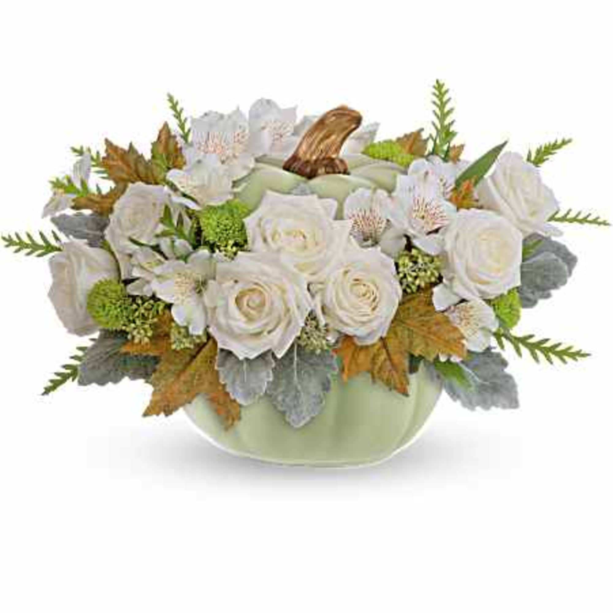 White rose arrangement in a pale green vase with autumn leaves