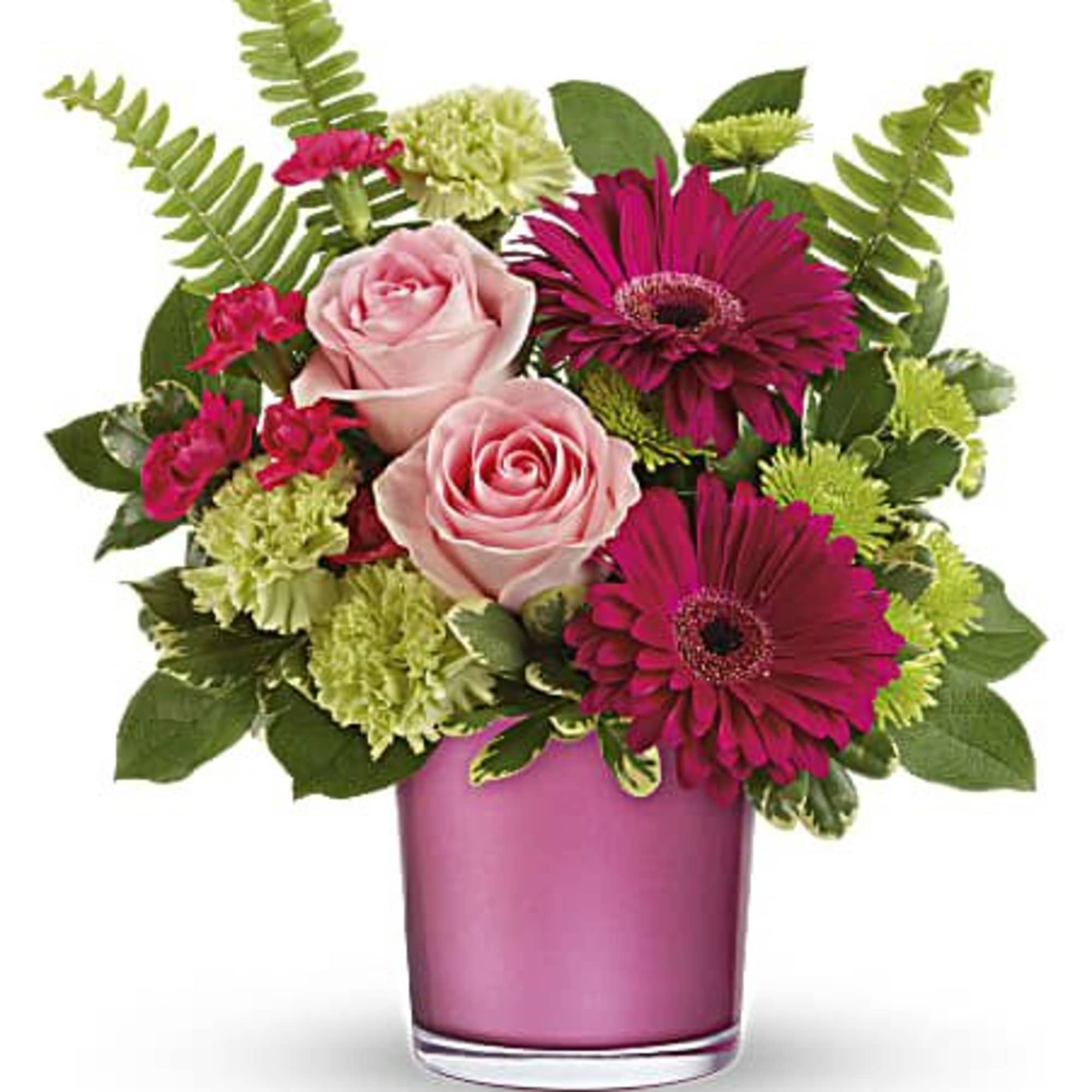 Pink roses and magenta gerberas in a pink glass vase