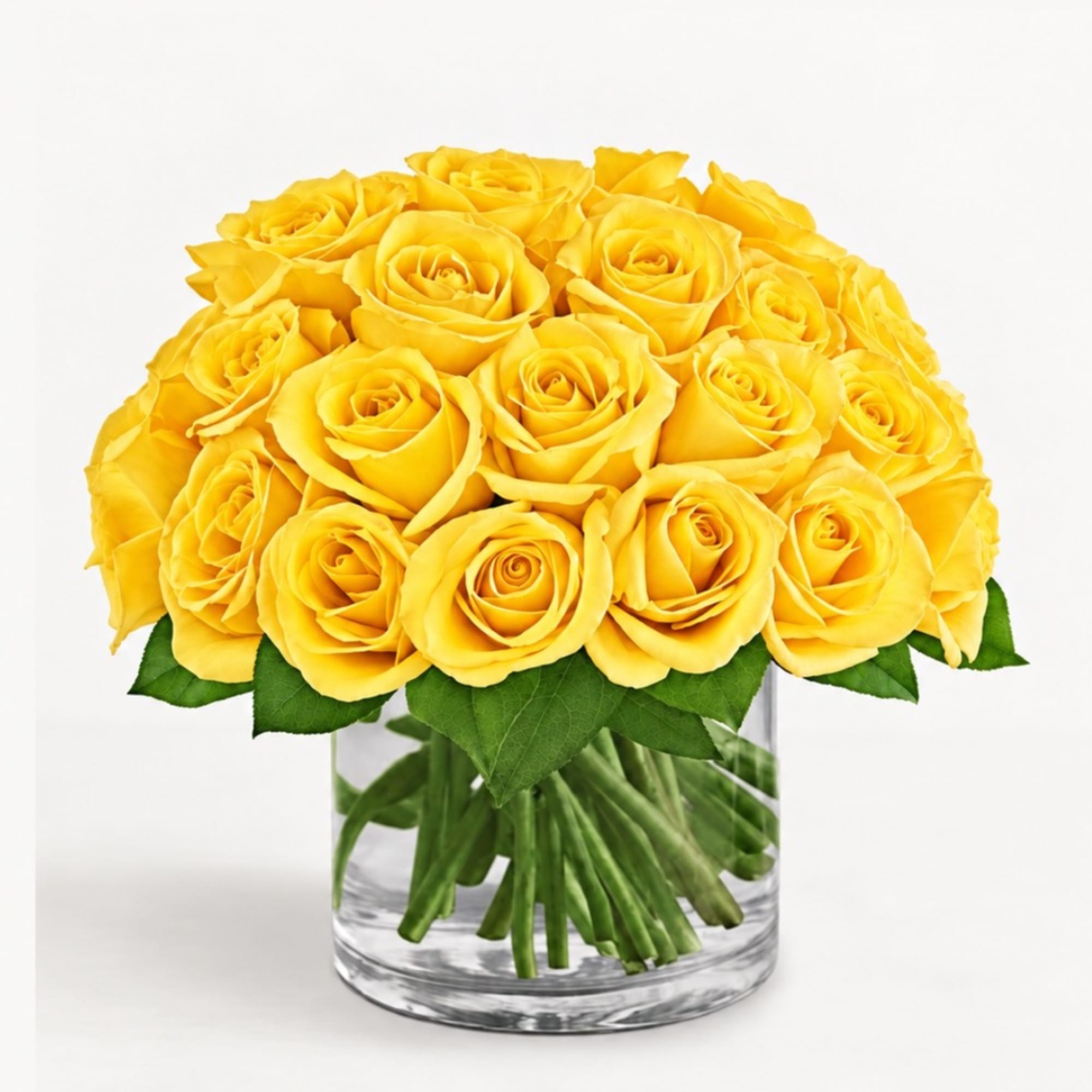 Yellow roses arranged in a clear glass vase