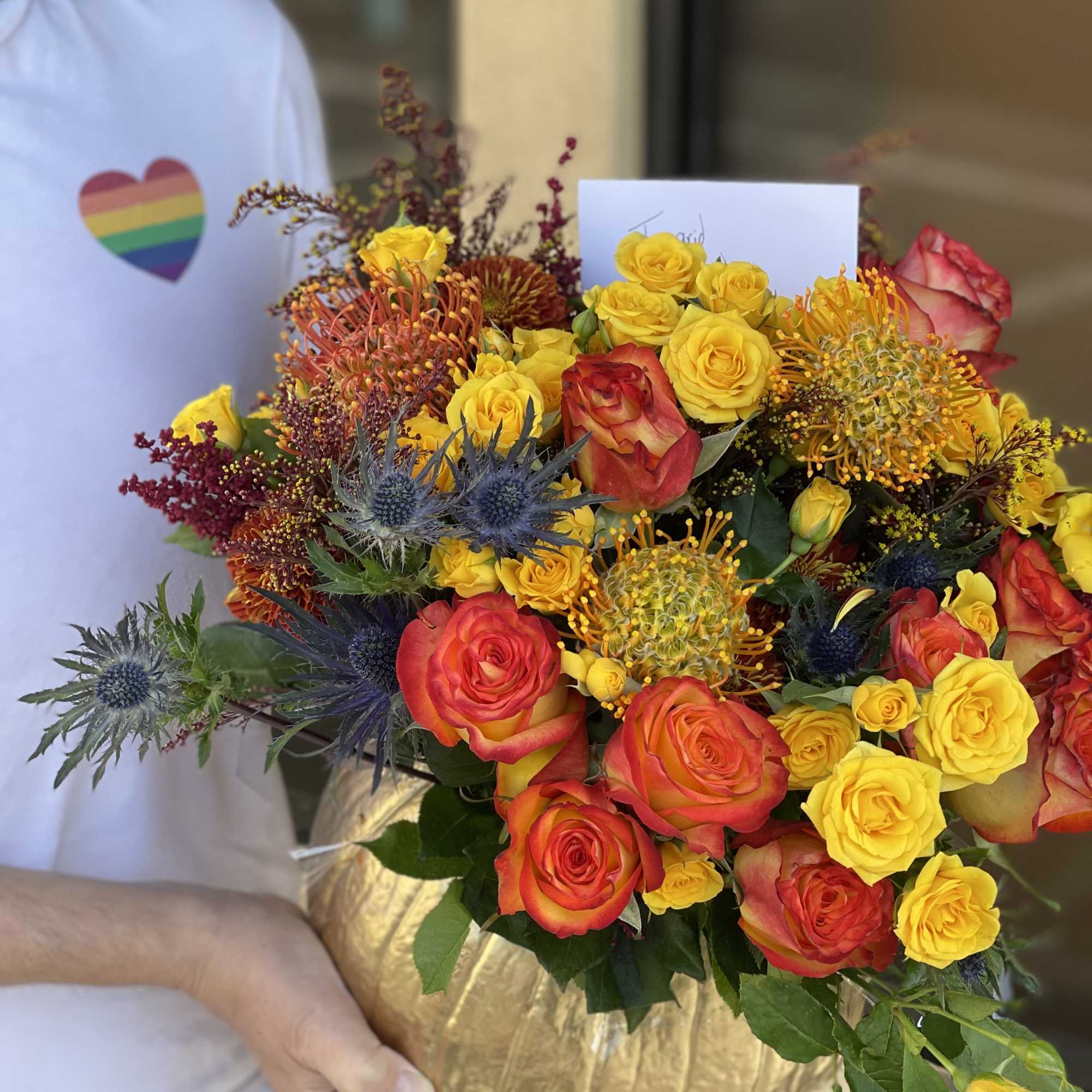 Send fall cheer with our special seasonal gourd. Fresh flowers, including pin, photo 2 of 2