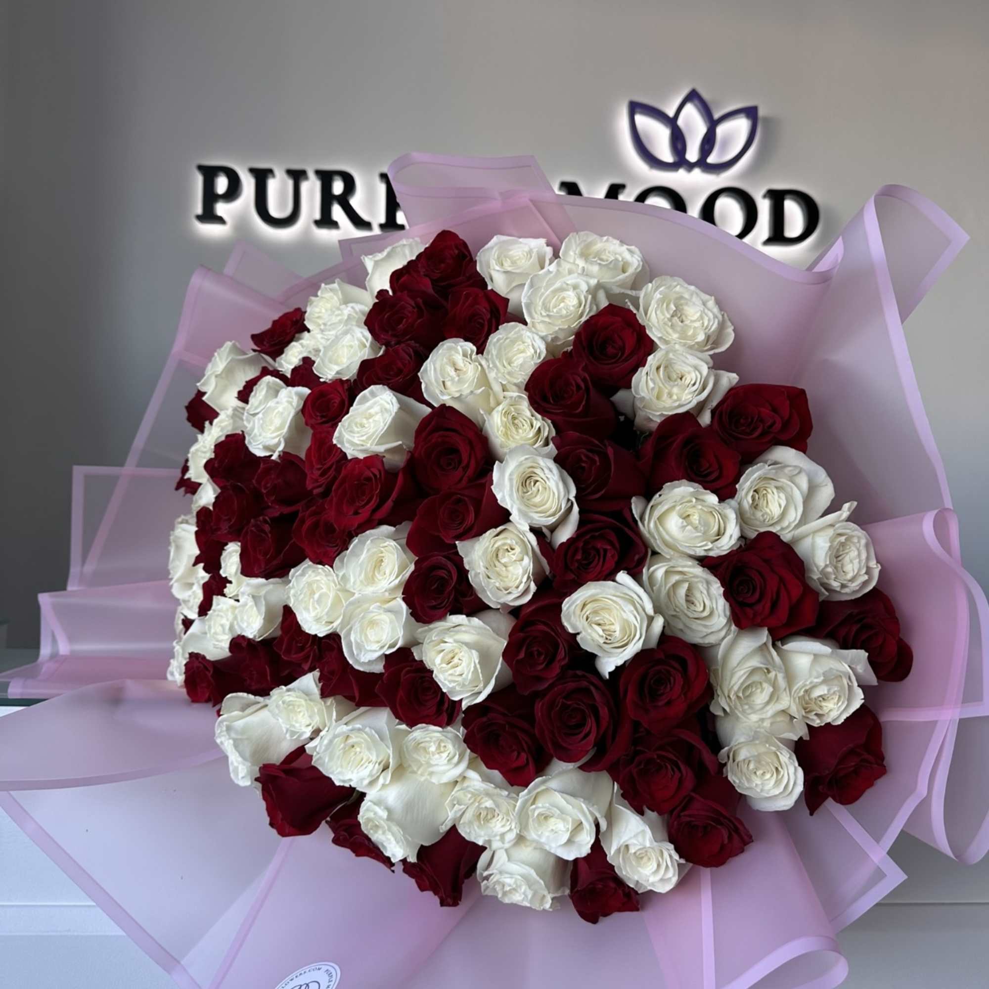 50 Roses.

Red &amp; White Roses
Elegant and timeless, the Red &amp; White Roses