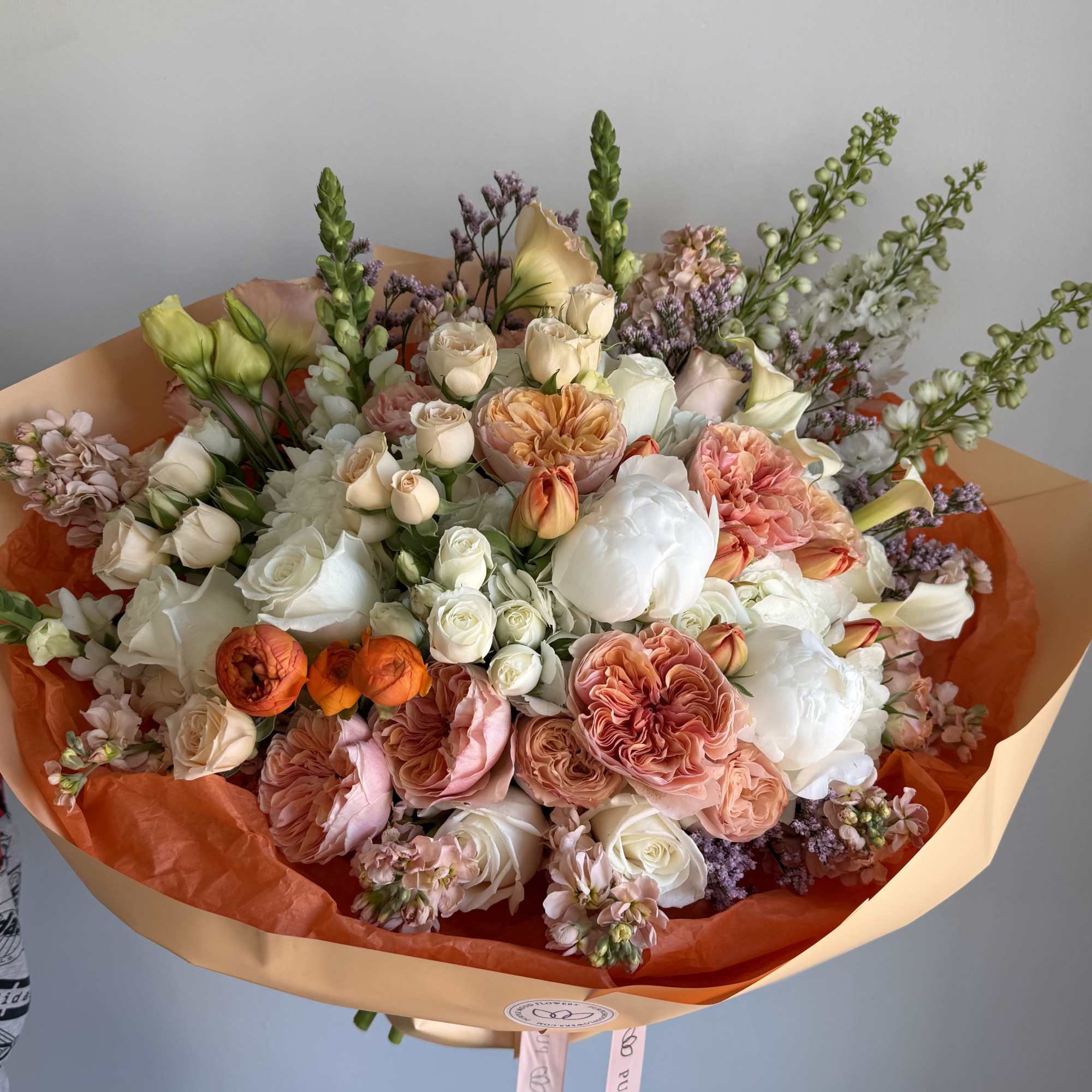 Bright, cheerful, and full of warmth &mdash; the Peachy Peach bouquet is