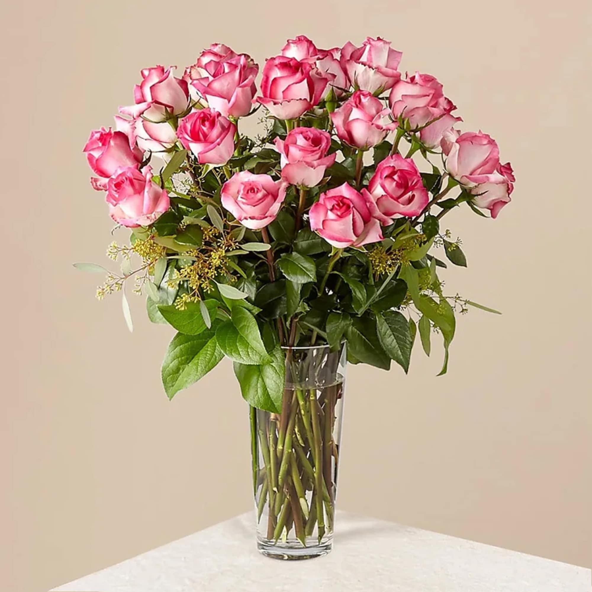 Pink Roses Bouquet hand-crafted in a glass vase with seasonal accents.

This arrangement, photo 2 of 3