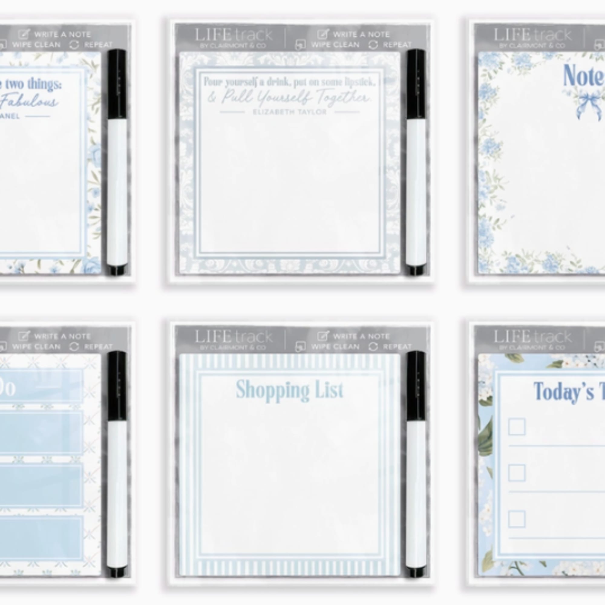 Set of six floral-themed dry-erase note pads with markers