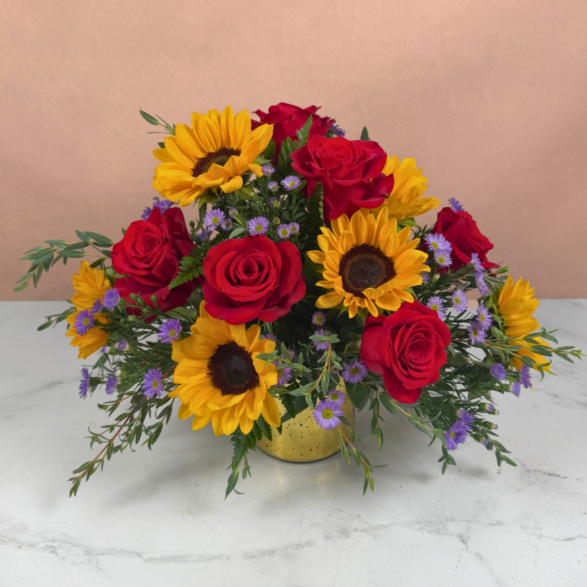 Bouquet of red roses and yellow sunflowers in a gold vase, photo 3 of 4