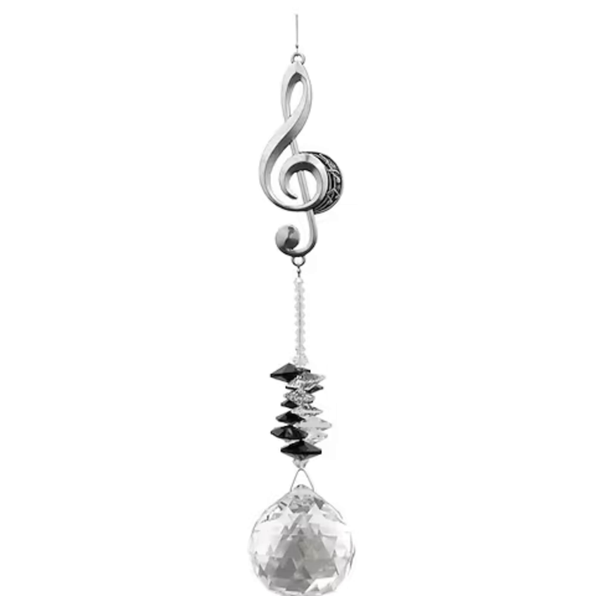 Silver treble clef hanging ornament with faceted clear crystal ball and black accents
