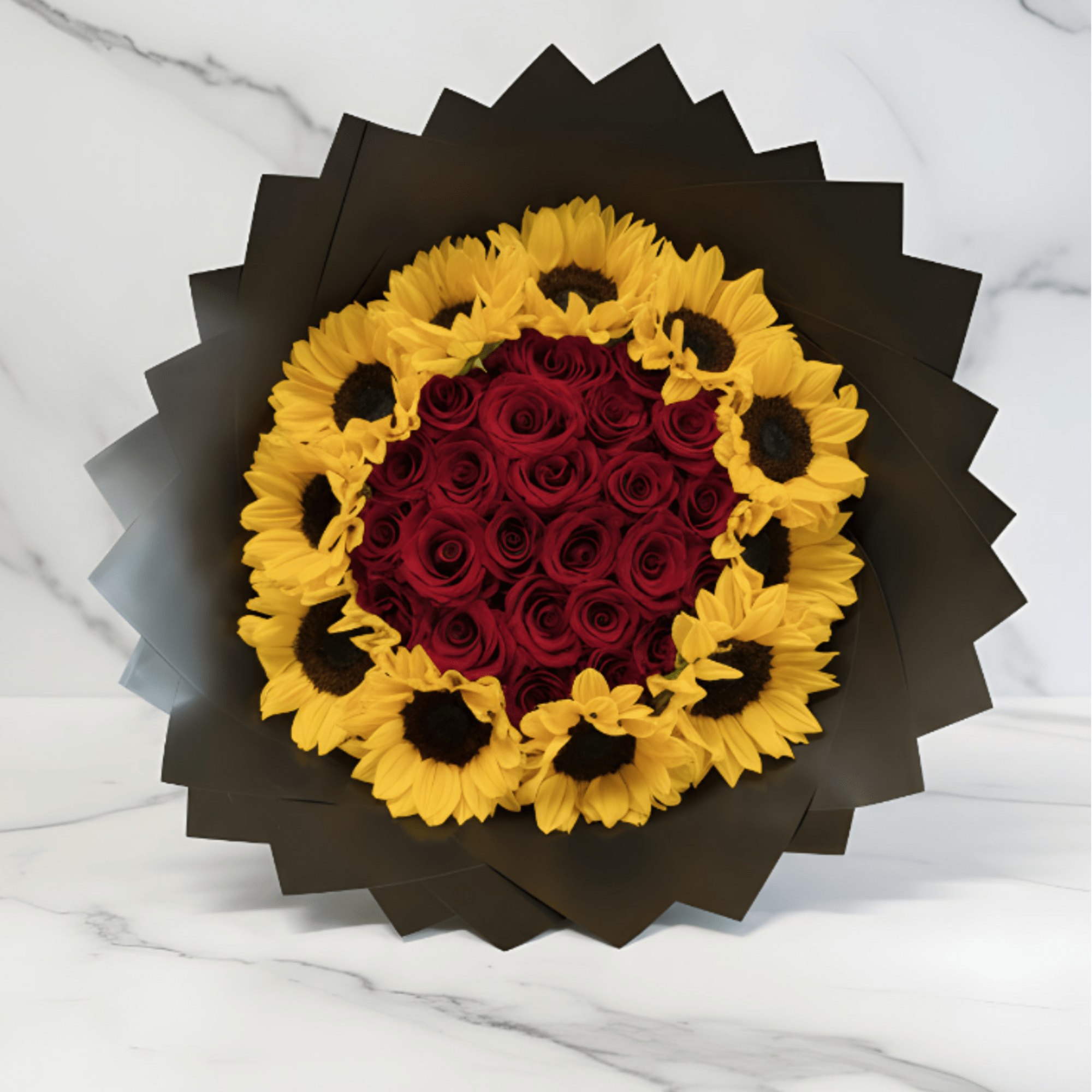 Stunning red rose and sunflower bouquet, featuring deep red roses surrounded by