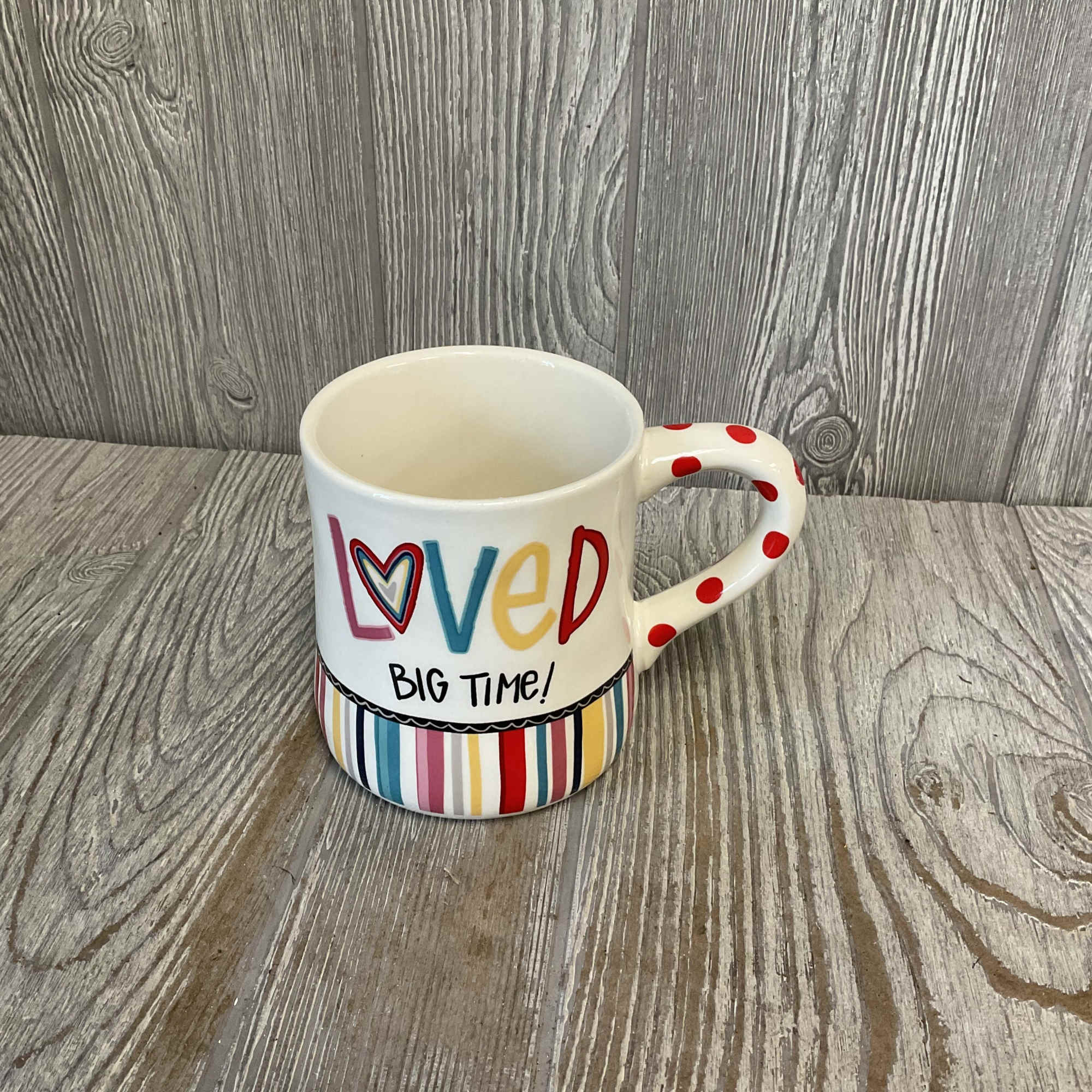 Decorative mug with the words "Loved Big Time!"