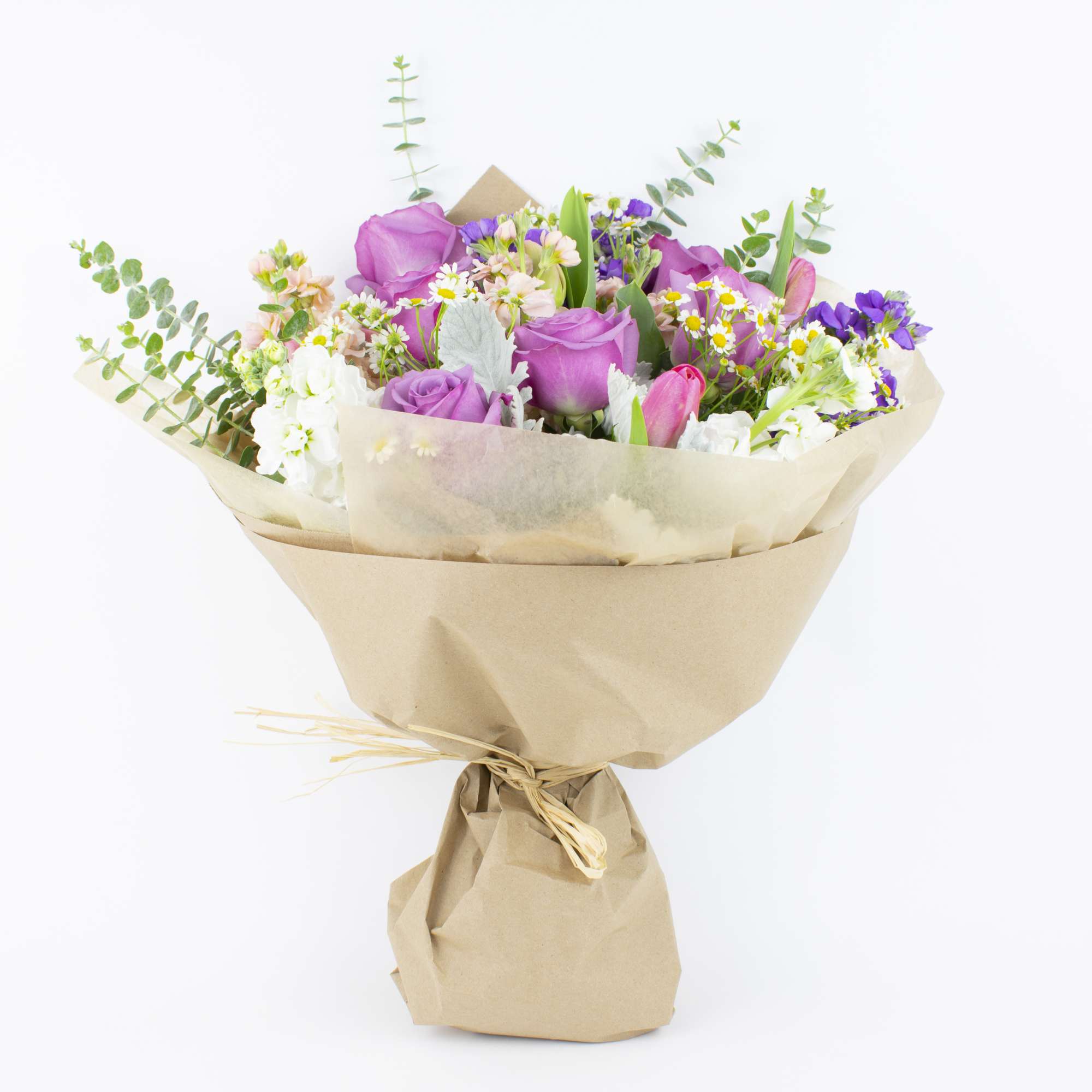 Bouquet of pink and purple flowers wrapped in brown paper, photo 3 of 4
