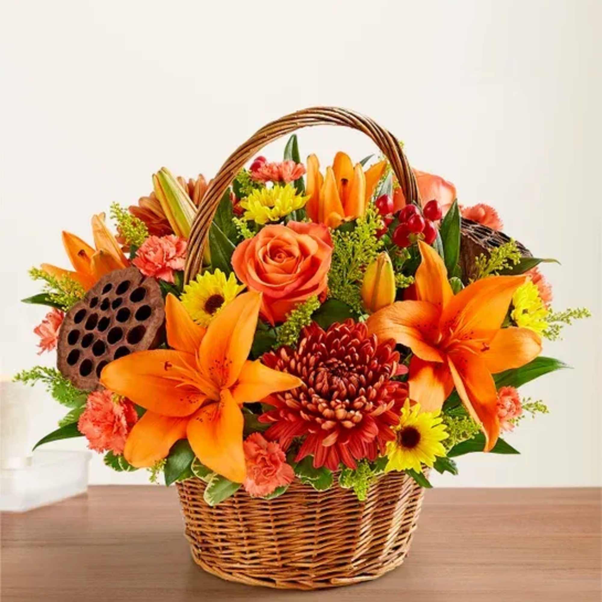 Warm autumn colors arranged artfulling in a wicker basket. ( Basket design