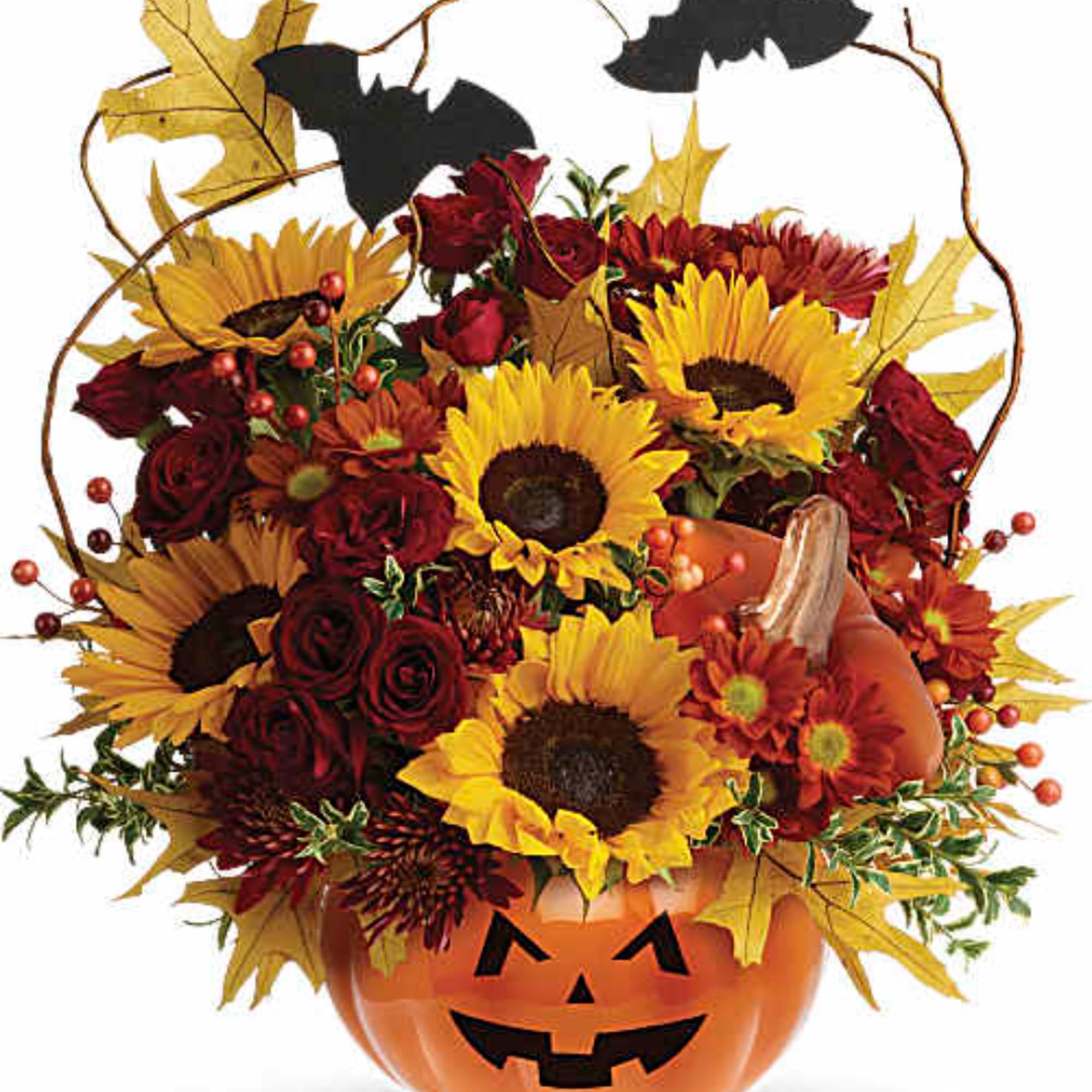 Halloween bouquet in a jack-o'-lantern pumpkin container with sunflowers and red roses