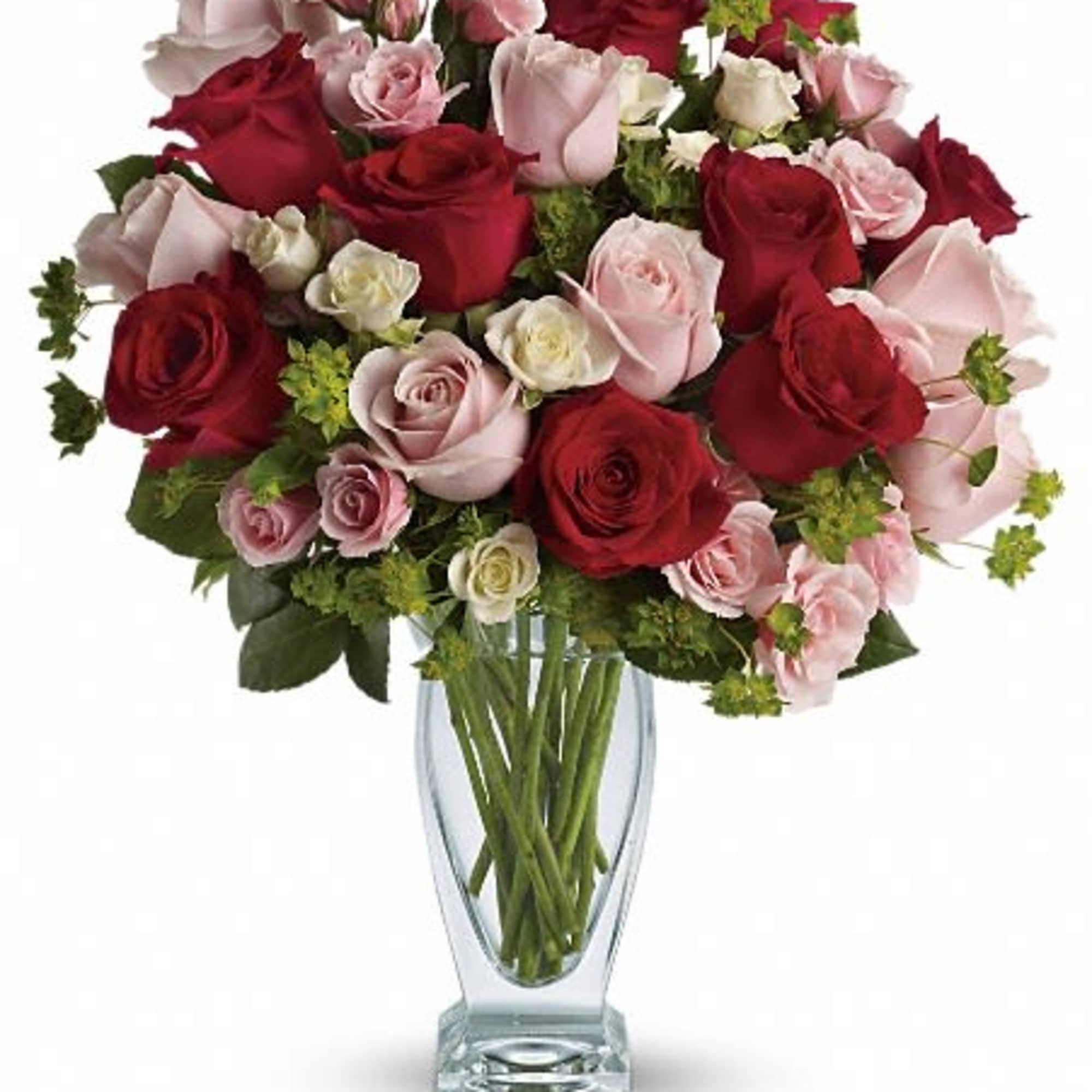 Bouquet of red and pink roses in a clear glass vase