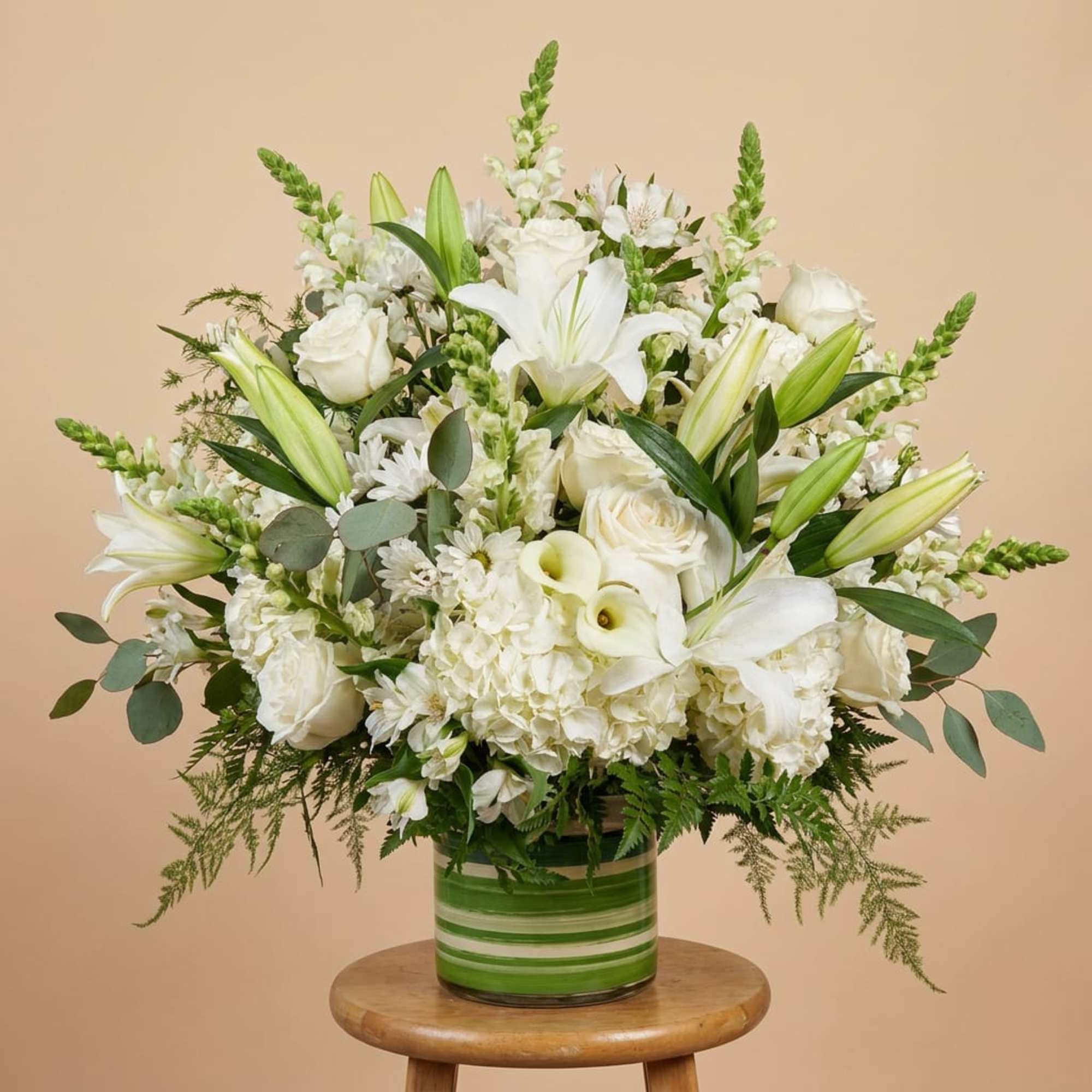 Introducing our exquisite White Elegance flower arrangement, a stunning composition of hydrangeas