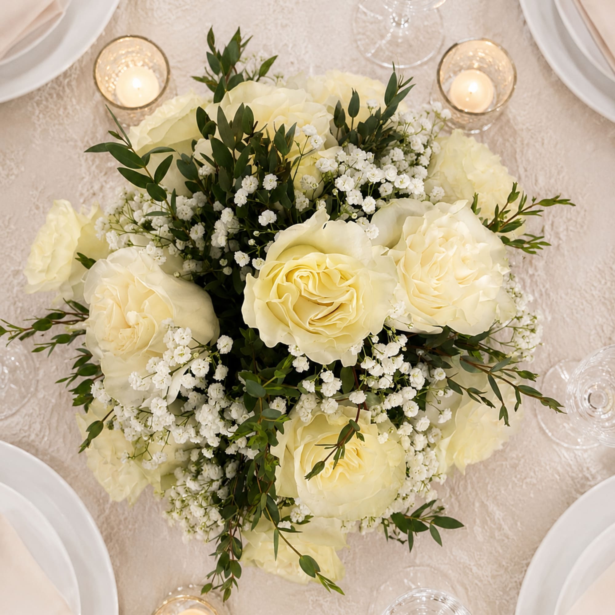 Signature Rose Wedding Centerpiece features one dozen premium roses arranged in a, photo 2 of 2