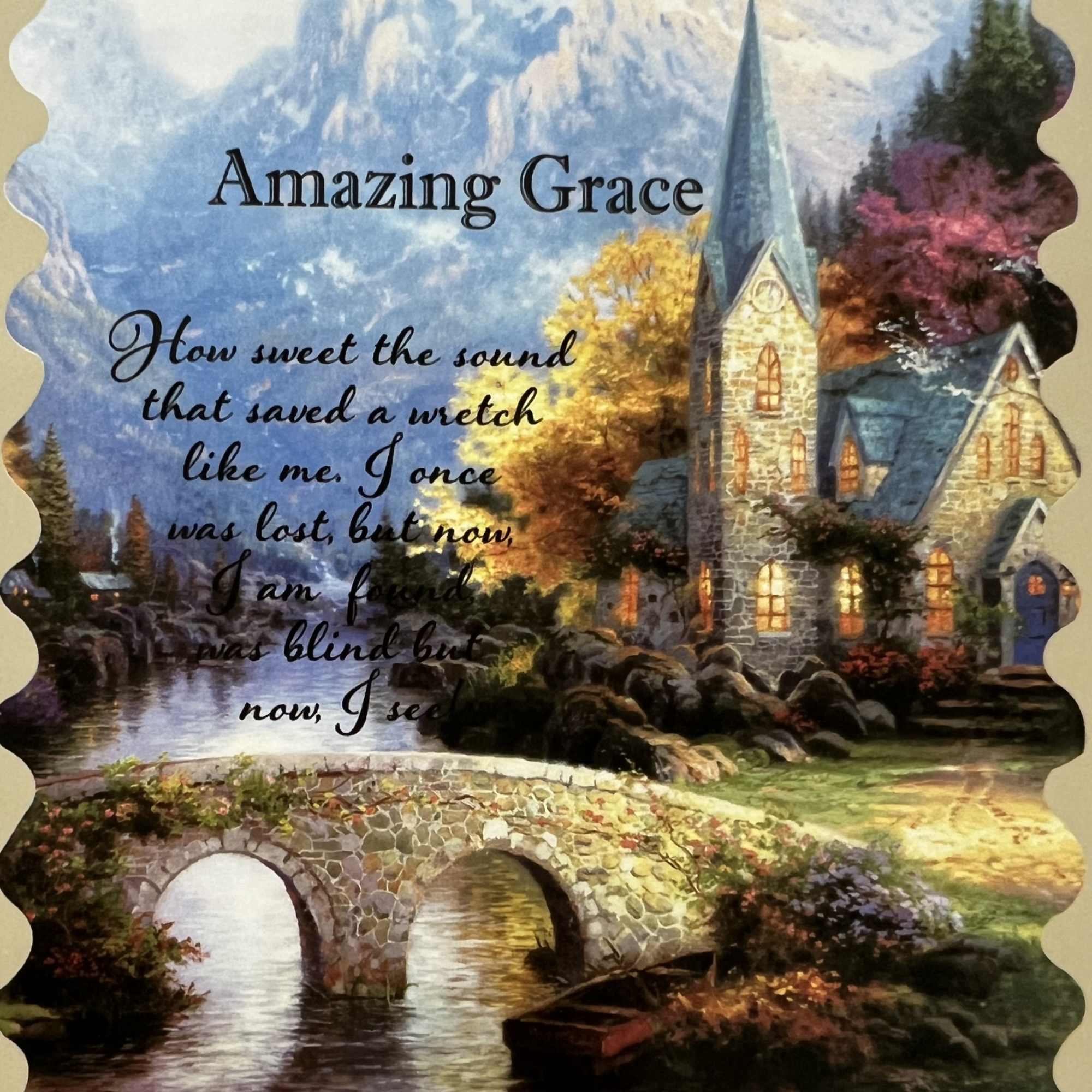 Decorative card with a church, bridge, and the words Amazing Grace