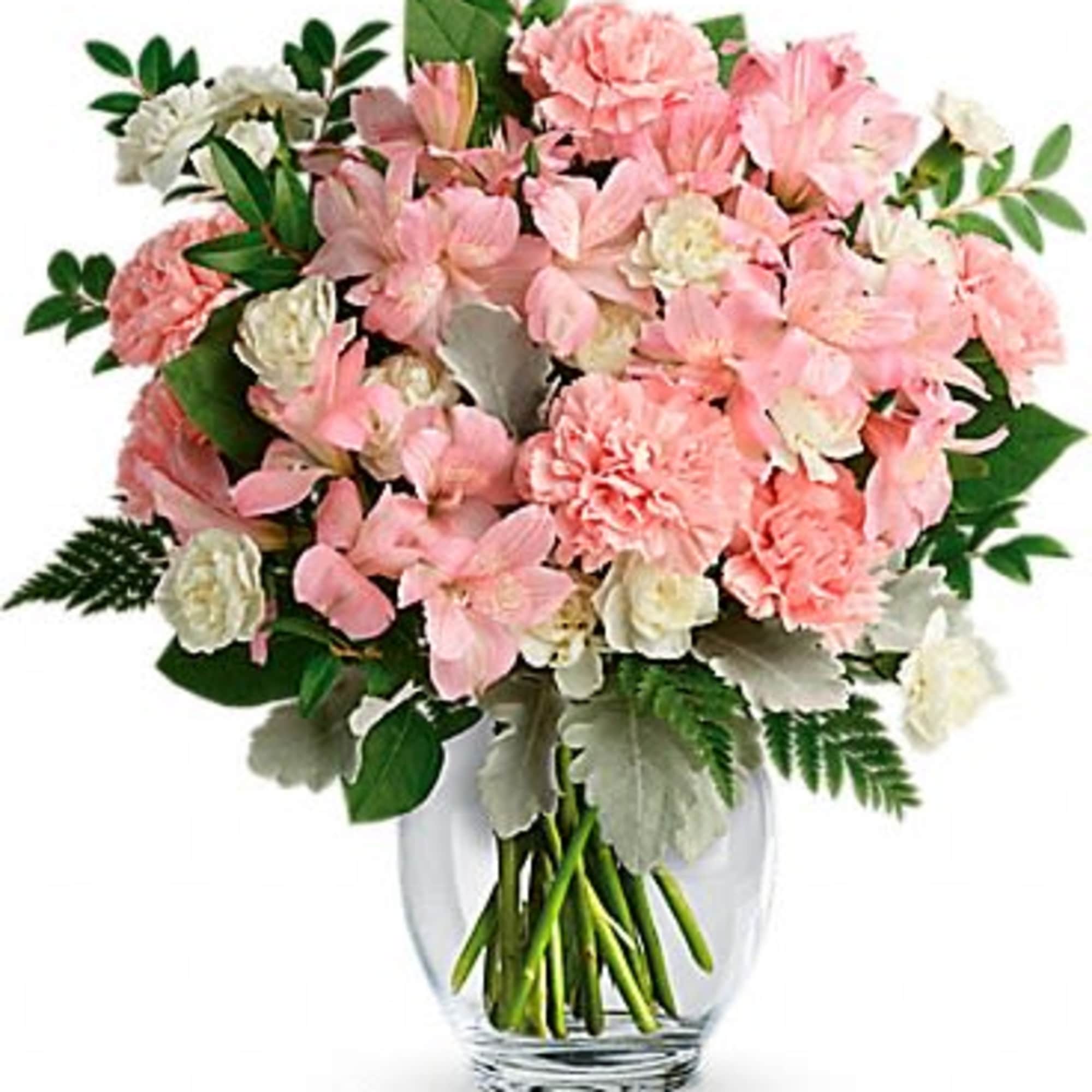 Pink and white flower bouquet in a clear glass vase