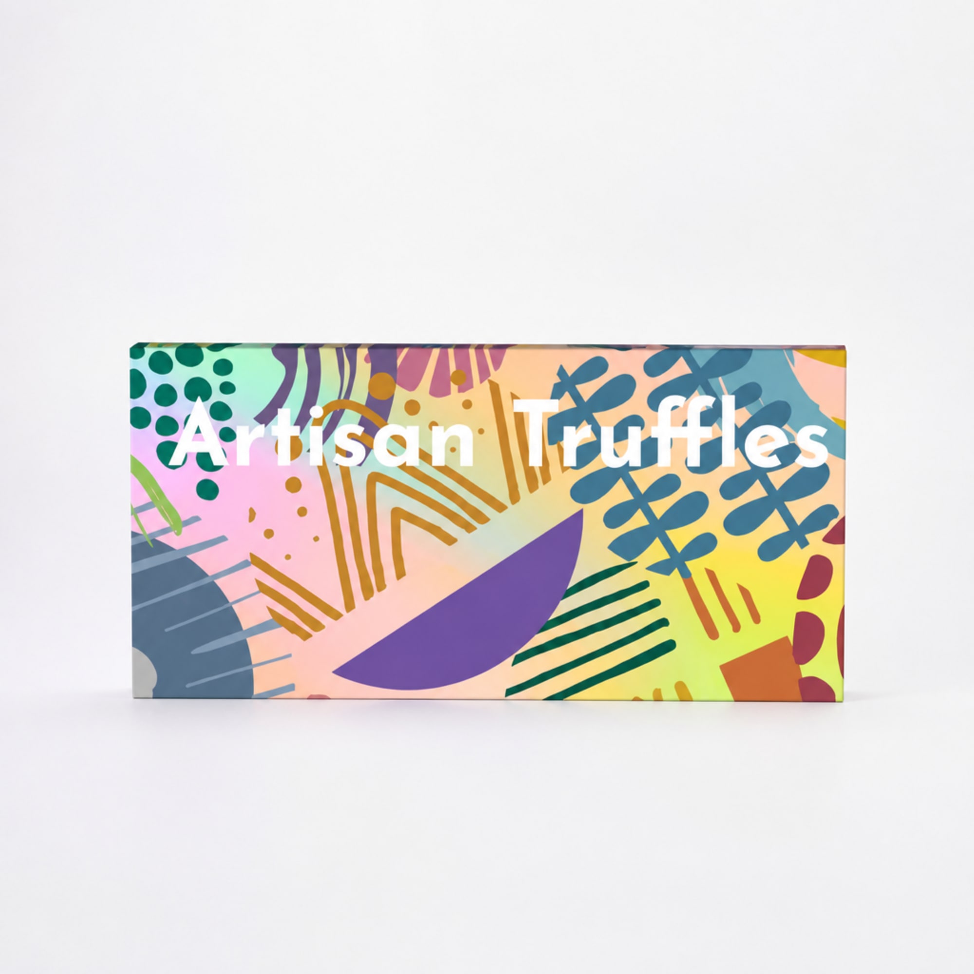Colorful box labeled Artisan Truffles on a white background
