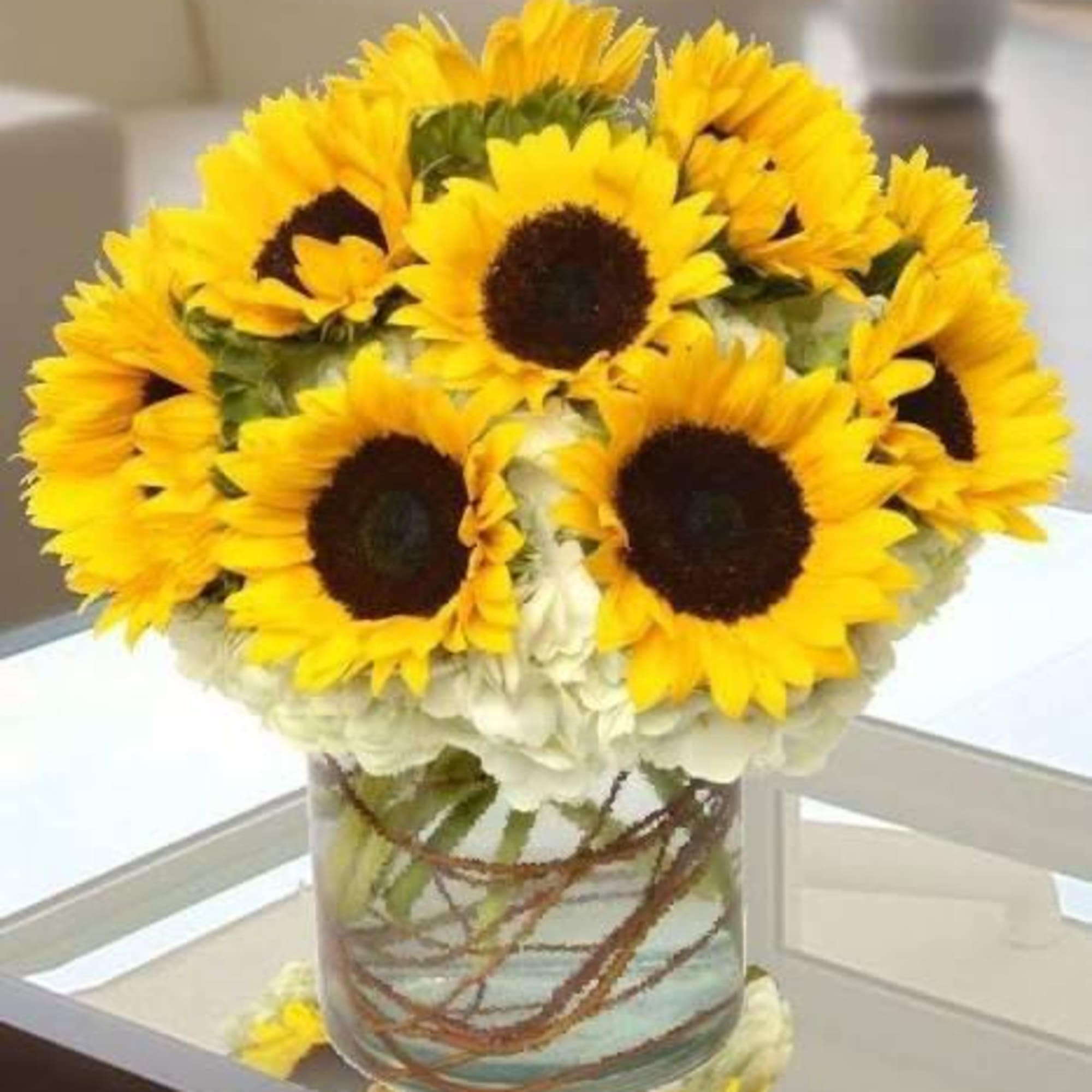 Sunflower bouquet in a clear glass vase