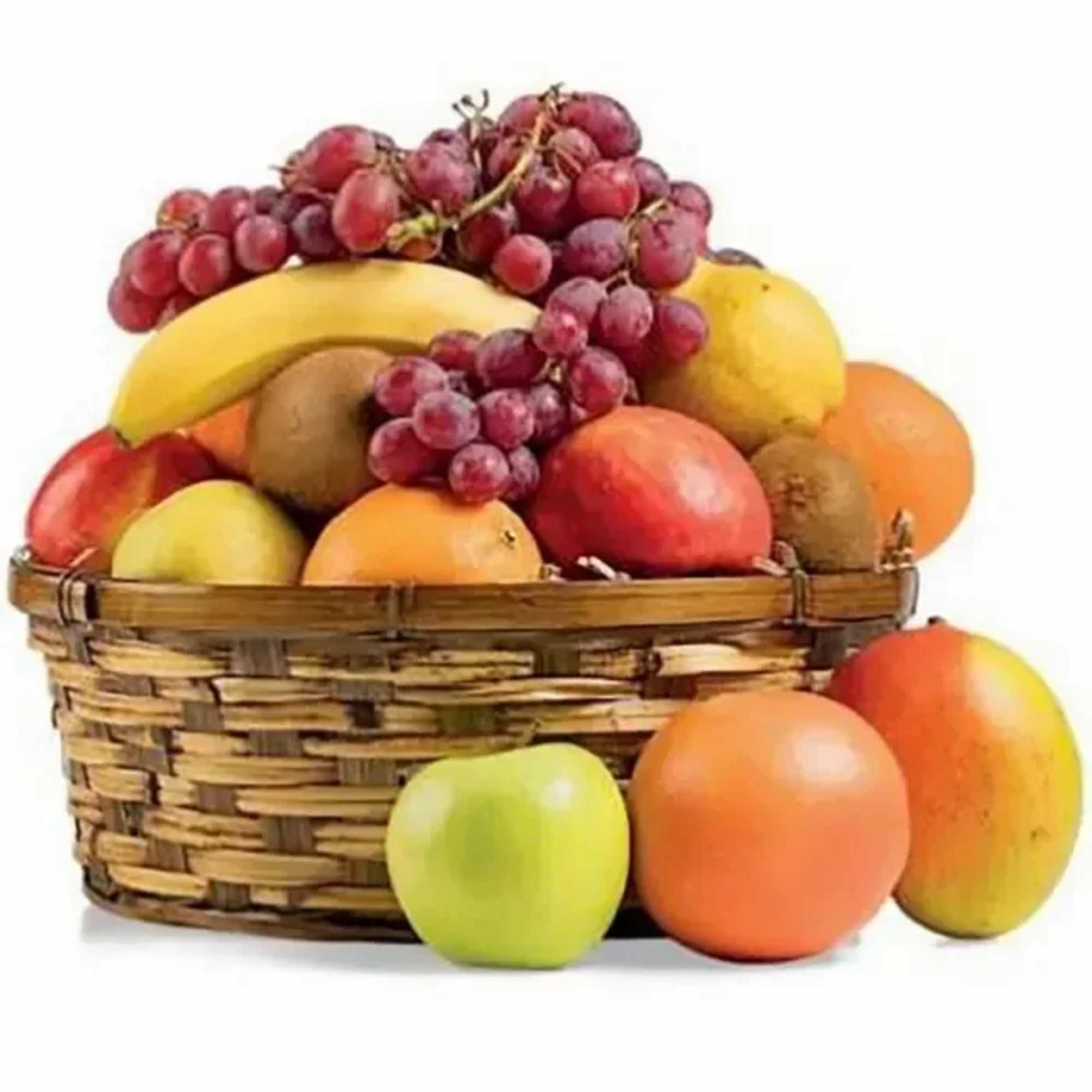 Basket of assorted fruit with grapes, bananas, and mangoes