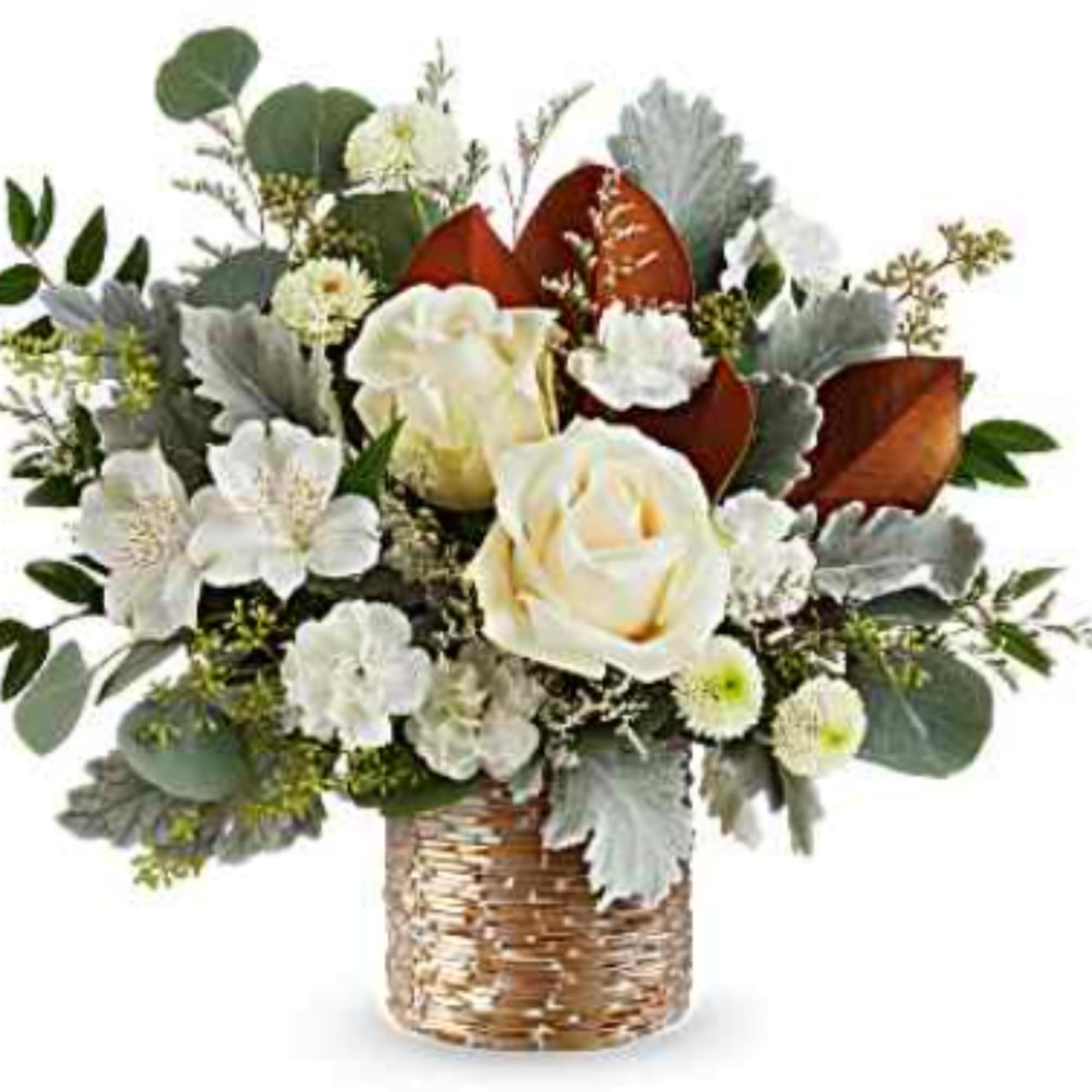 White roses and mixed blooms in a woven basket vase