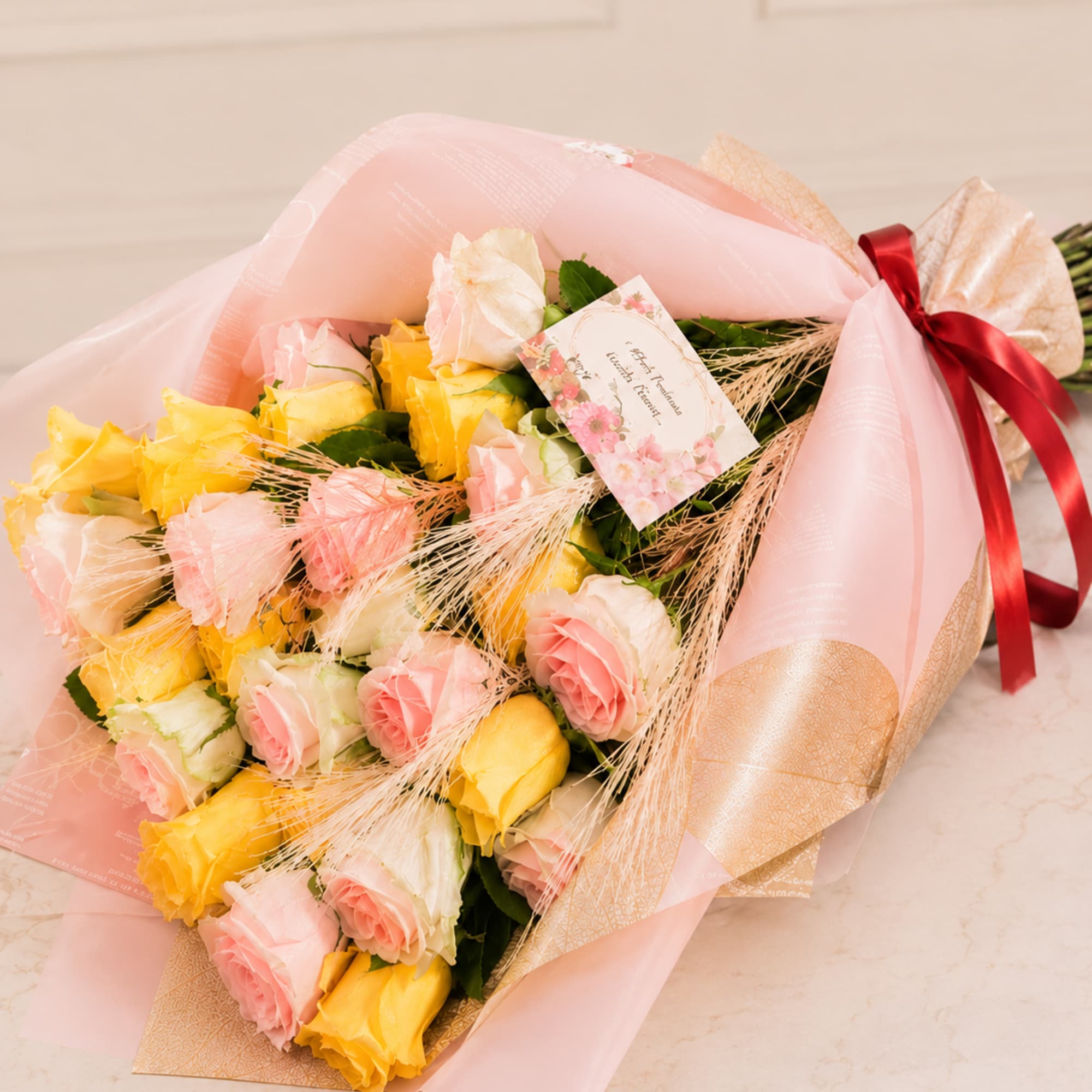 A radiant flower arrangement crafted in a soft, romantic palette that blends