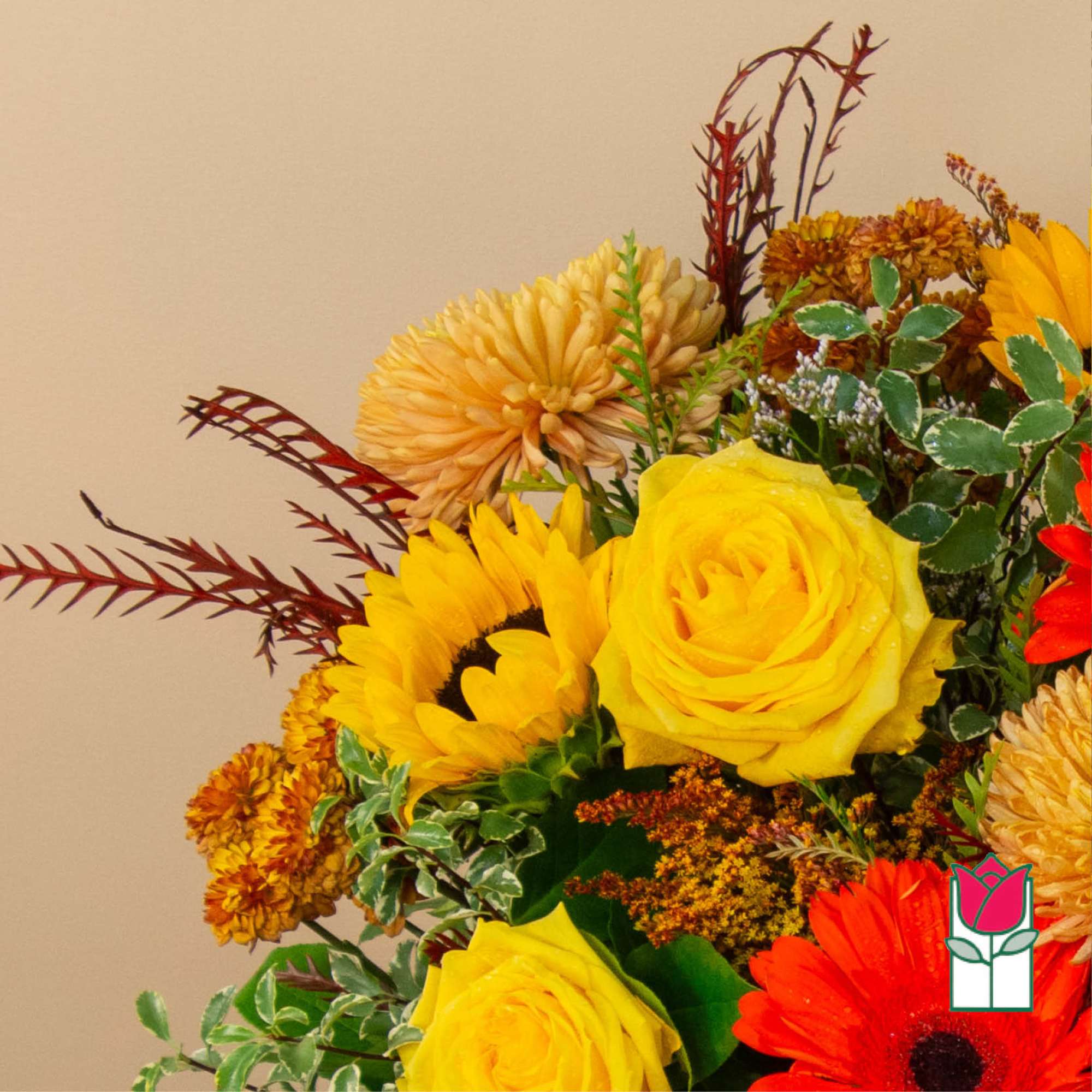 Bouquet with yellow roses, sunflowers, and orange mums