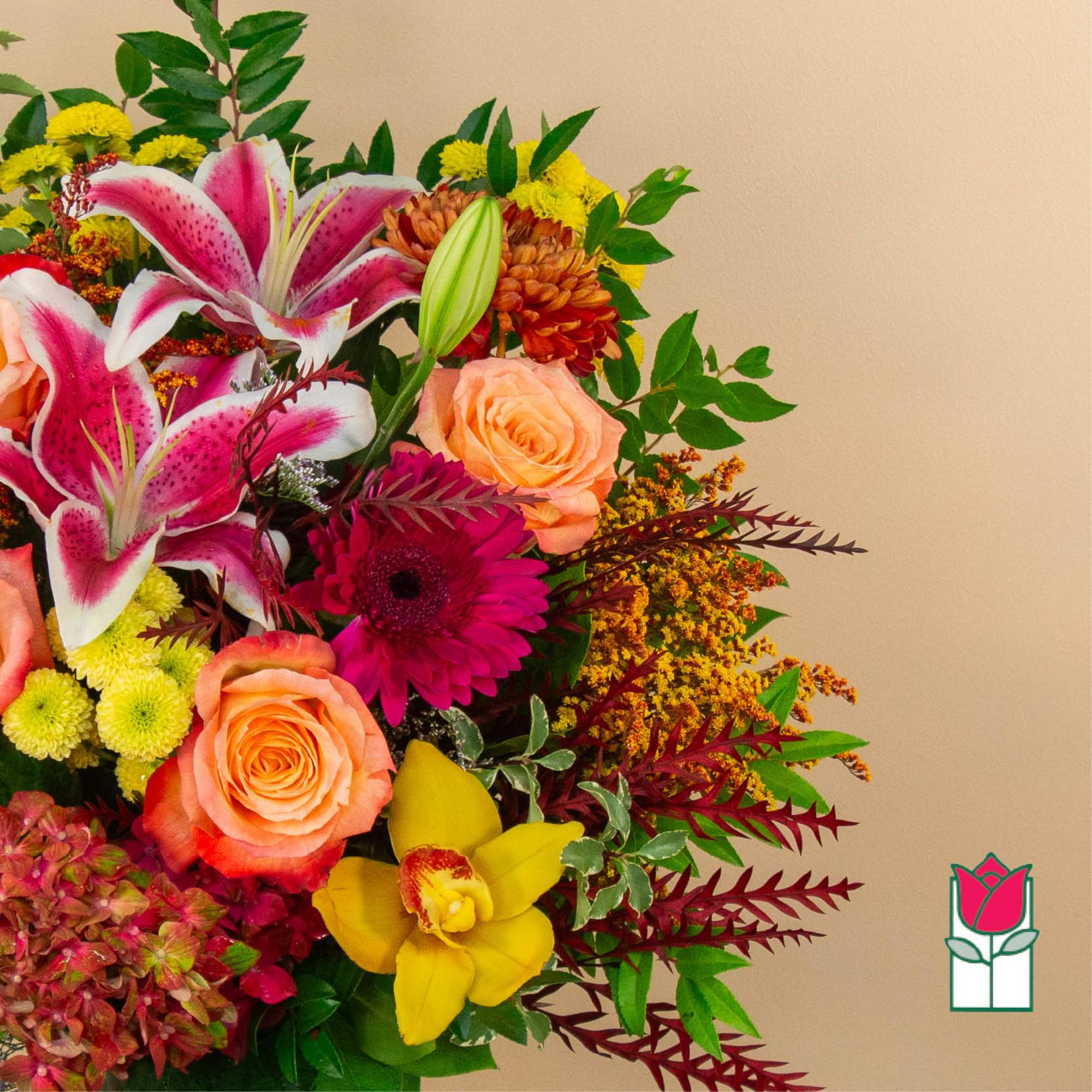 Colorful bouquet with lilies, roses, gerbera daisies, and orchids