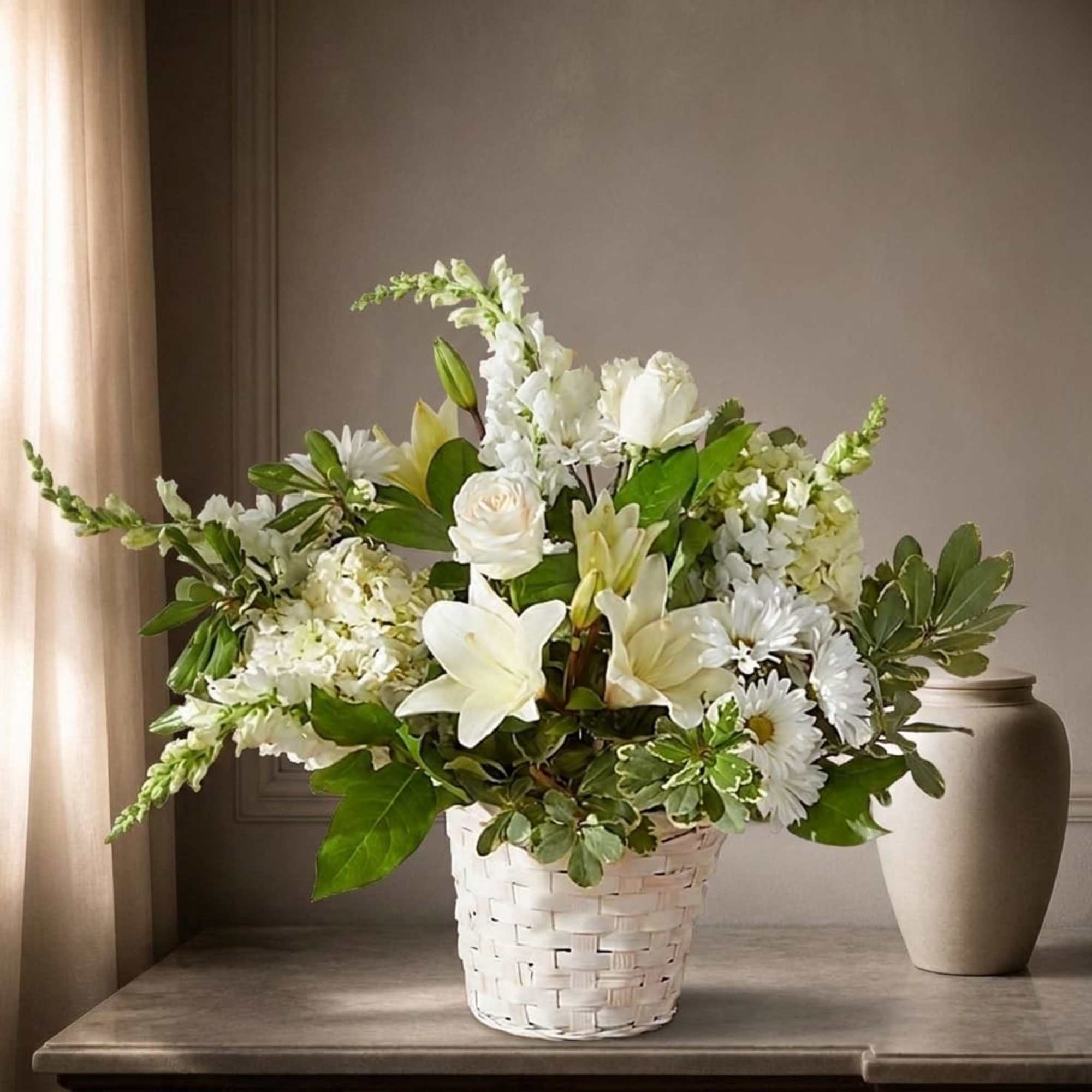 Our funeral basket arrangement is a beautiful tribute, crafted with love and