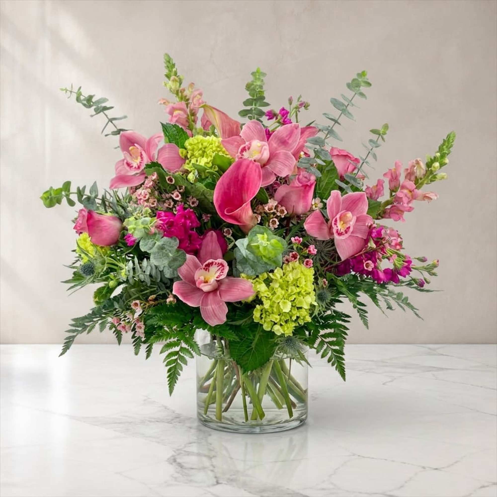 Our magnificent Explosion of color flower arrangement is a true masterpiece that