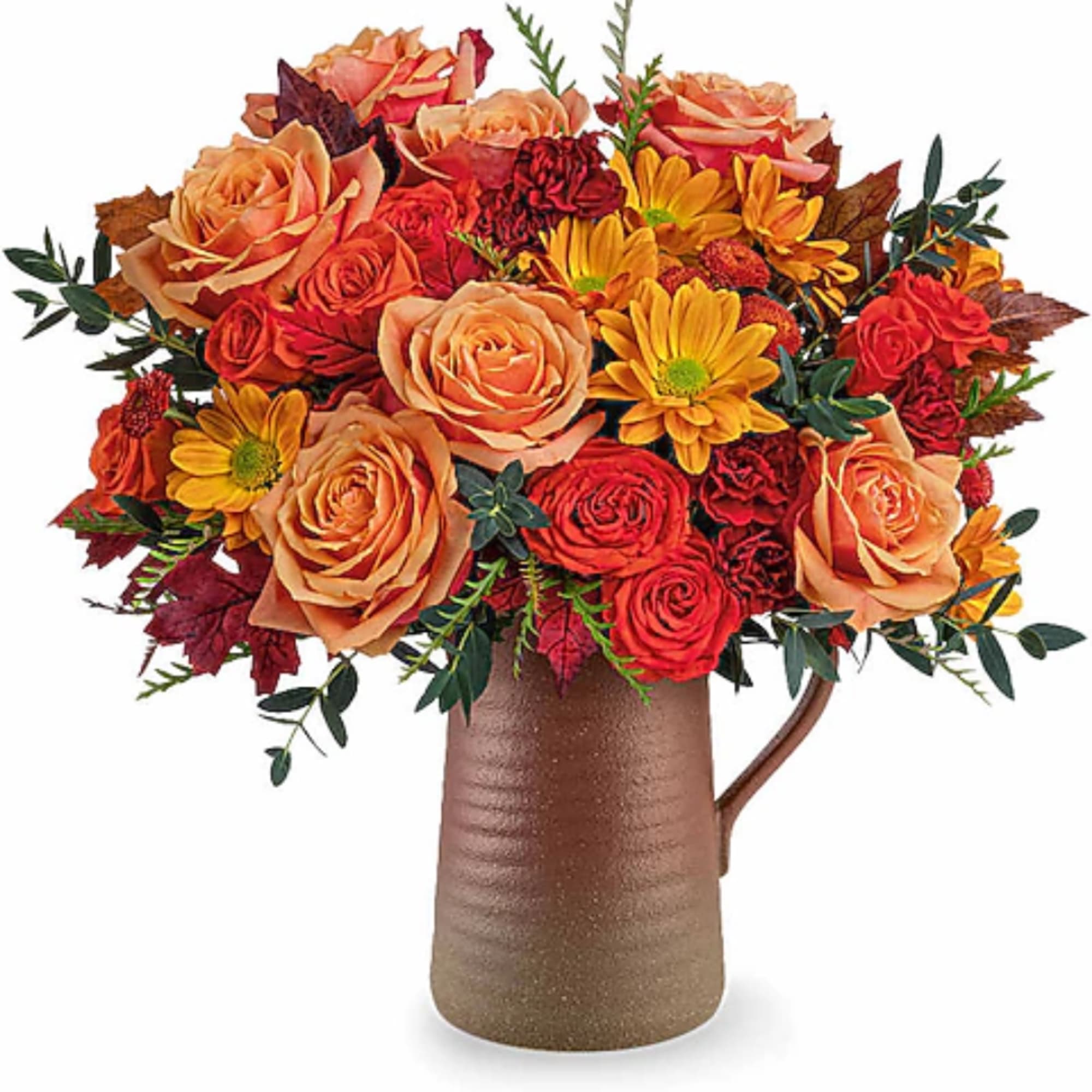 Bouquet of orange and red flowers in a brown pitcher vase