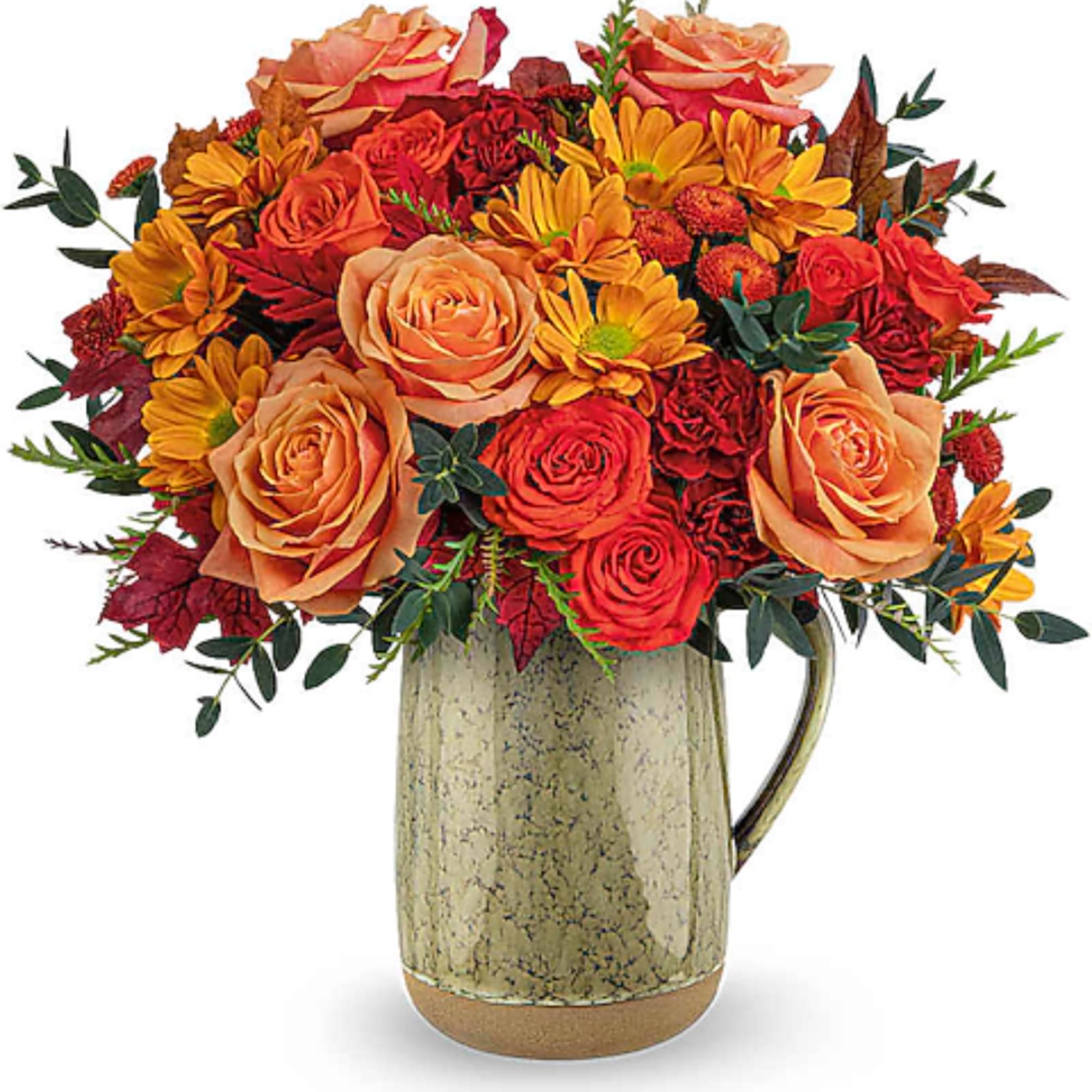 Orange and red roses with yellow daisies in a ceramic pitcher vase