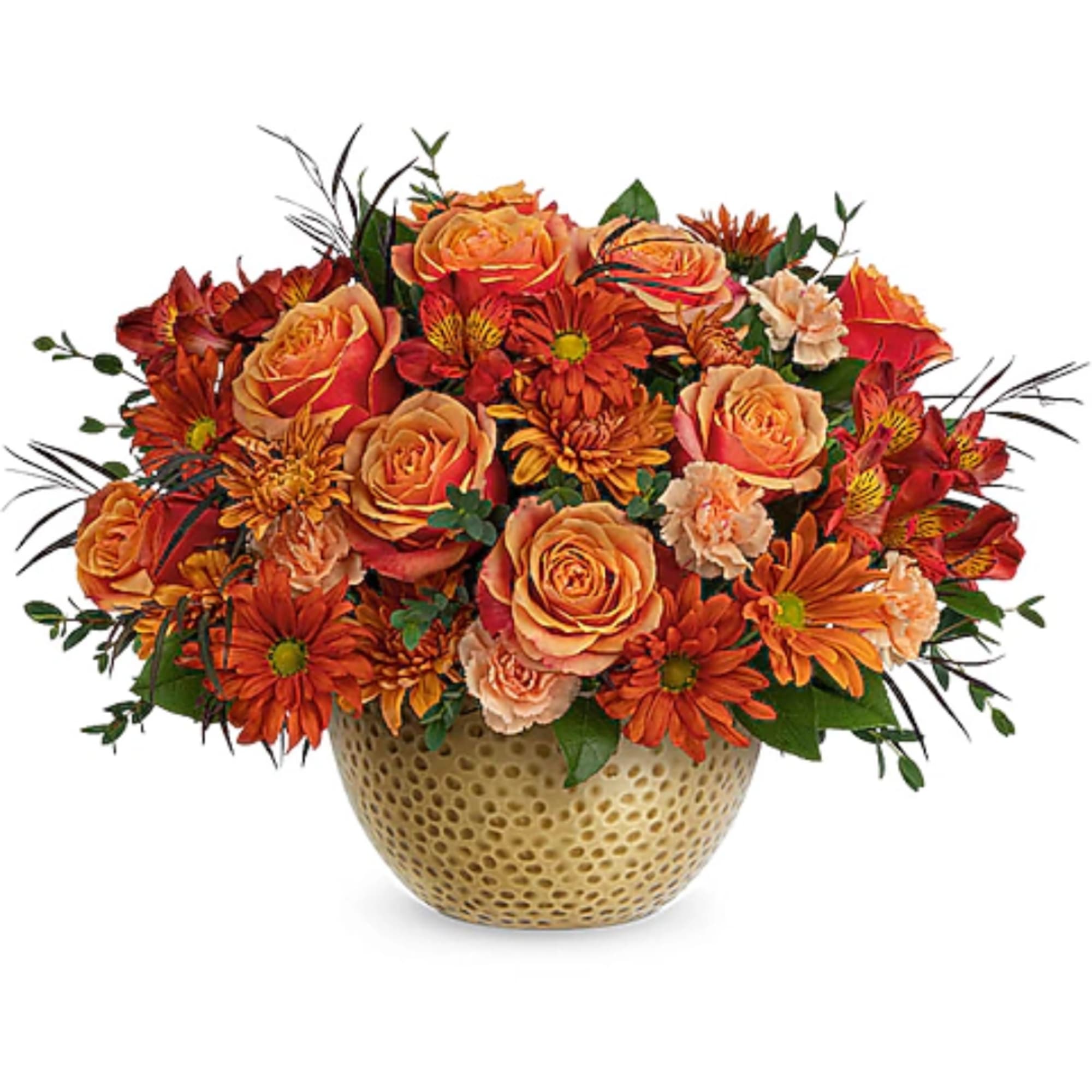 Orange and red mixed flower arrangement in a textured gold vase