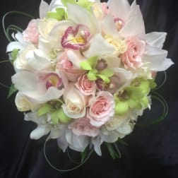 Bouquet of white orchids and pale pink roses