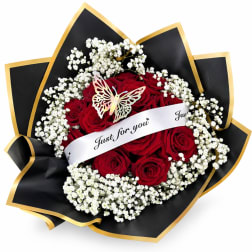 Red rose bouquet with white baby's breath and a butterfly topper