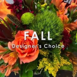 Fall bouquet with orange roses and mixed autumn flowers