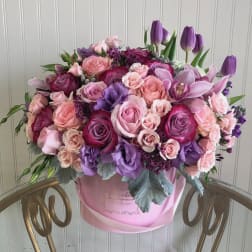 Sophia - light and dark pink and purple roses, spray roses, purple tulips, licentious, stock and dusty miller leaves