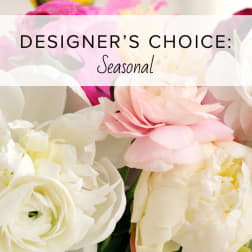 Designer’s choice seasonal bouquet with pink and white flowers