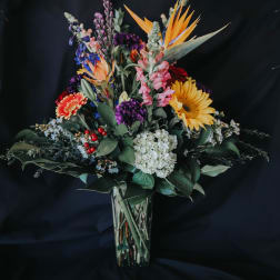 Colorful mixed bouquet in a clear glass vase