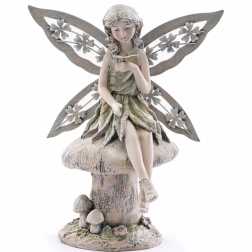 Fairy on Mushroom with Butterfly Figure