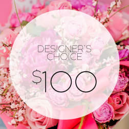 Pink floral bouquet with a "Designer’s Choice $100" overlay
