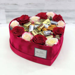 Heart-shaped box of roses filled with assorted chocolates